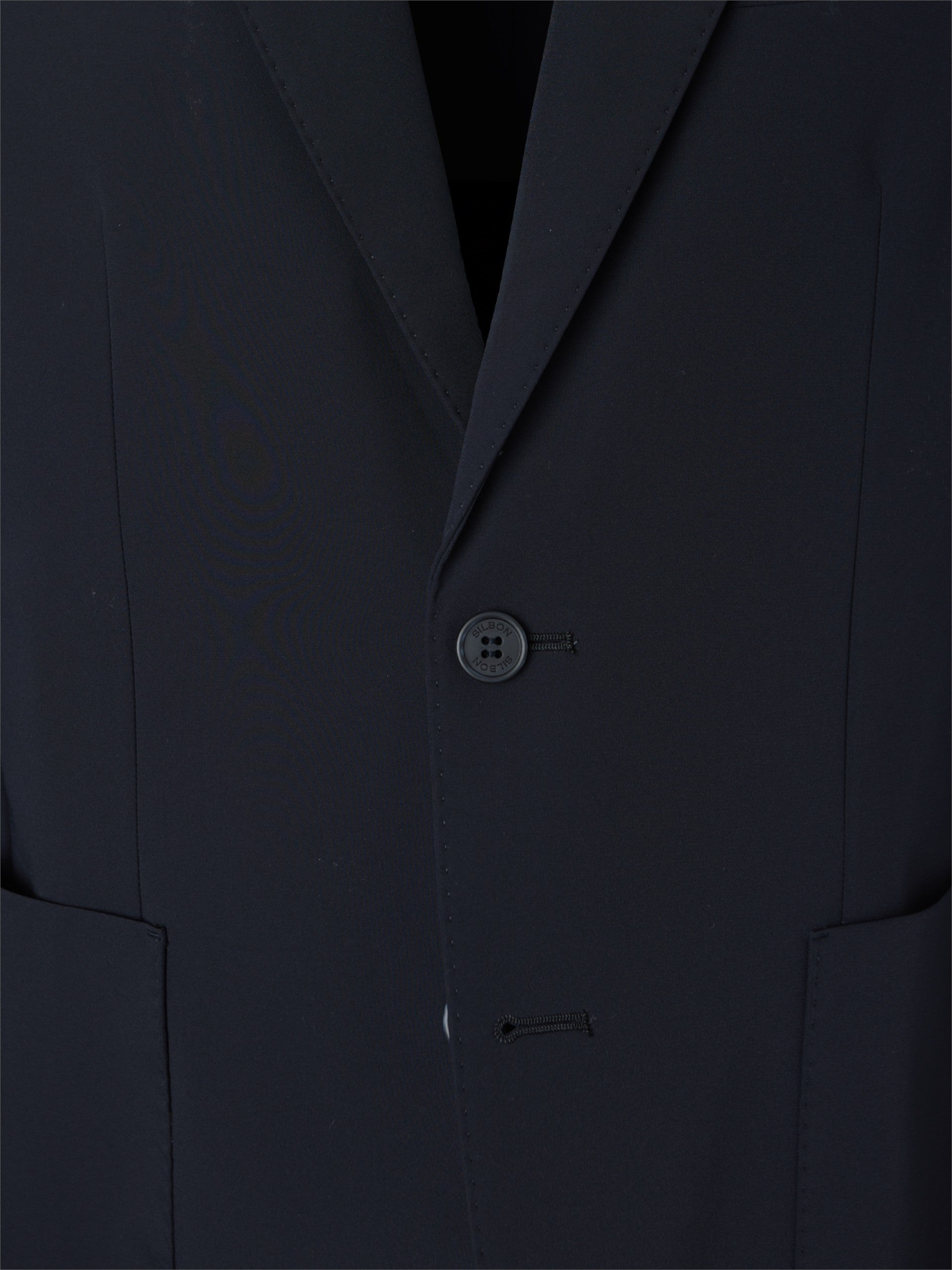 Americana tecnica azul marino