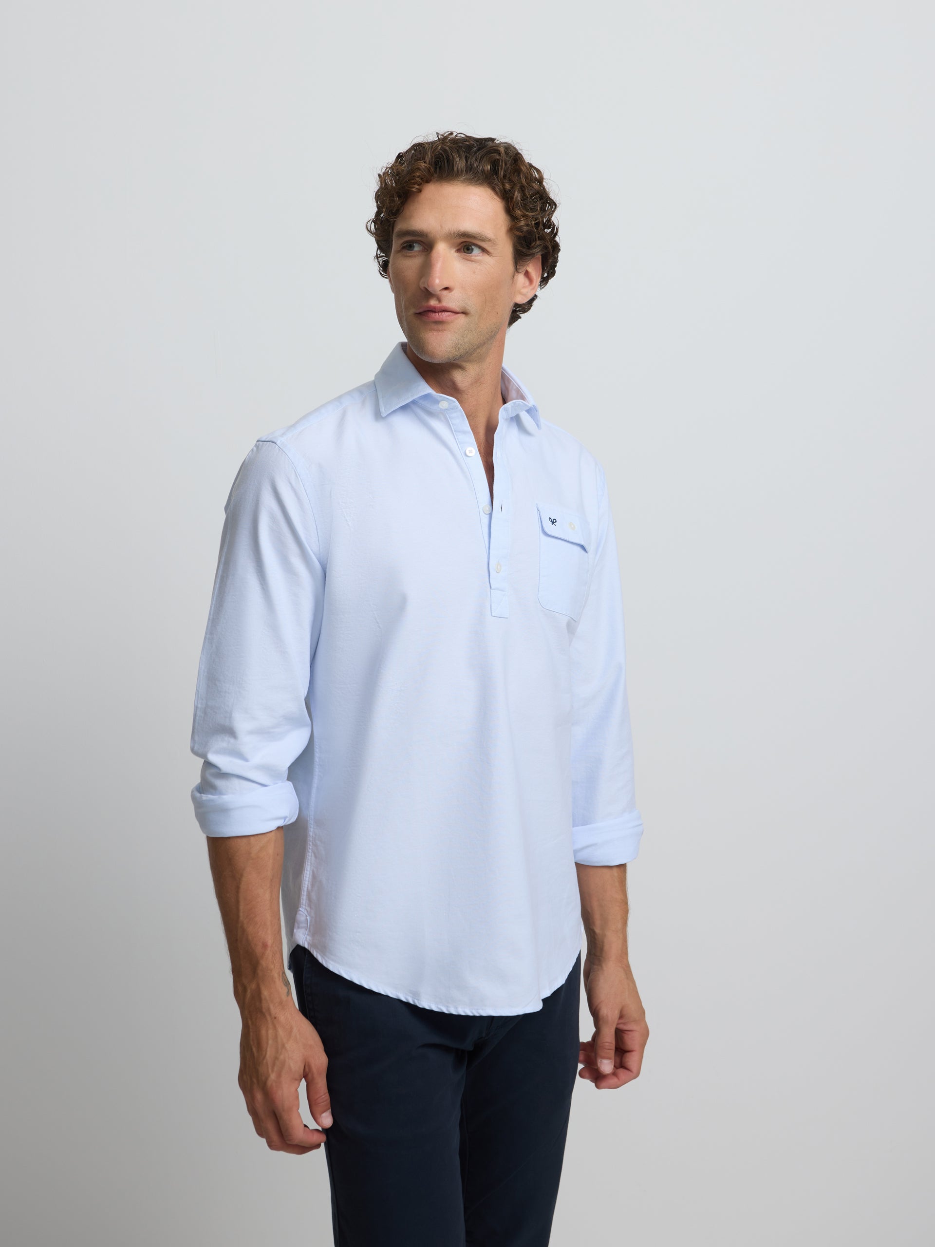 Polo sport Oxford bleu clair avec poche