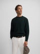 Green cable knit sweater