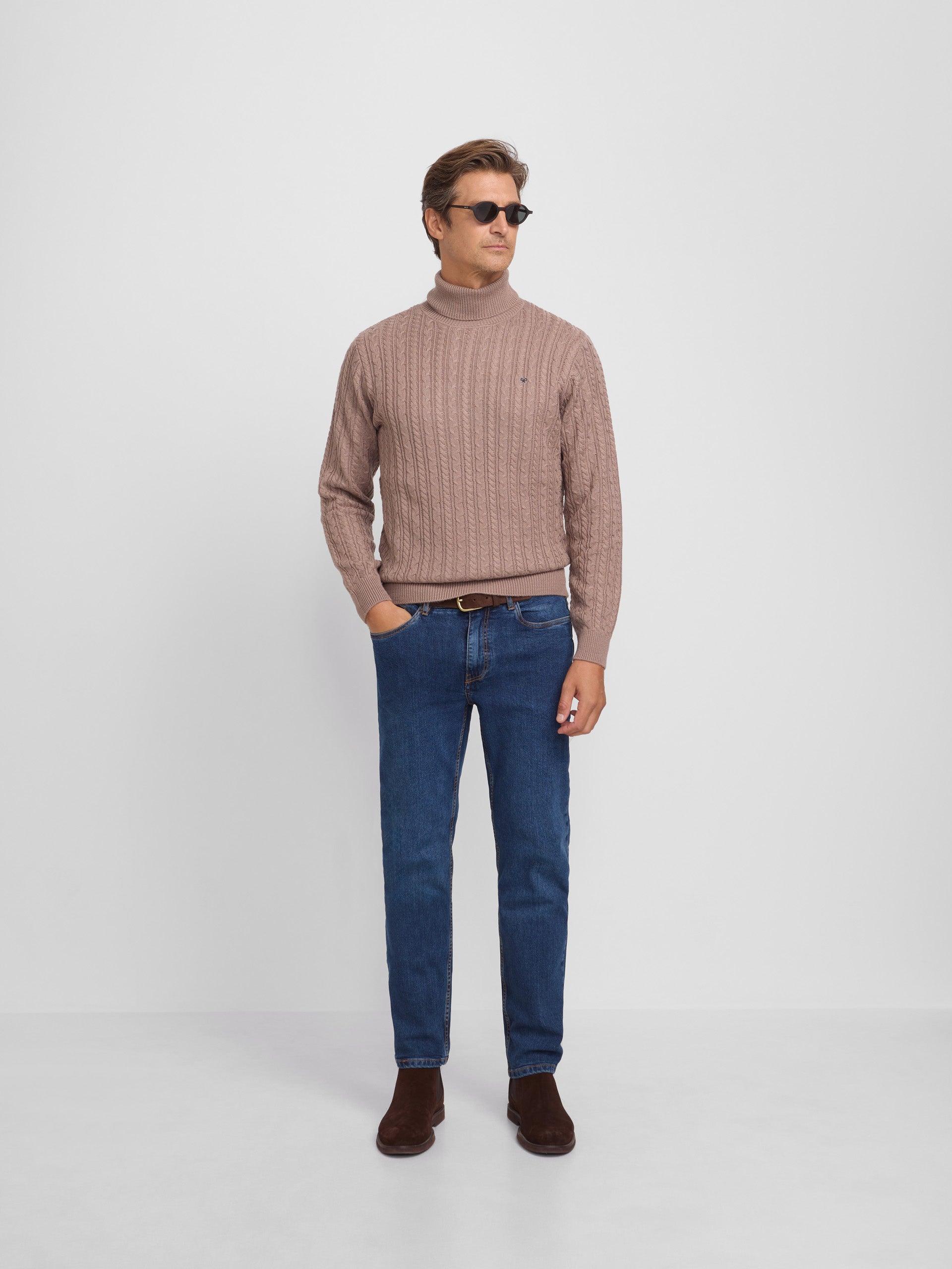 Light brown cable knit turtleneck sweater