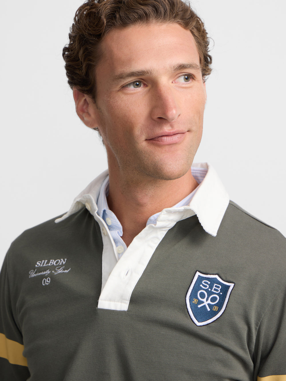 Classic rugby polo shirt with green shield