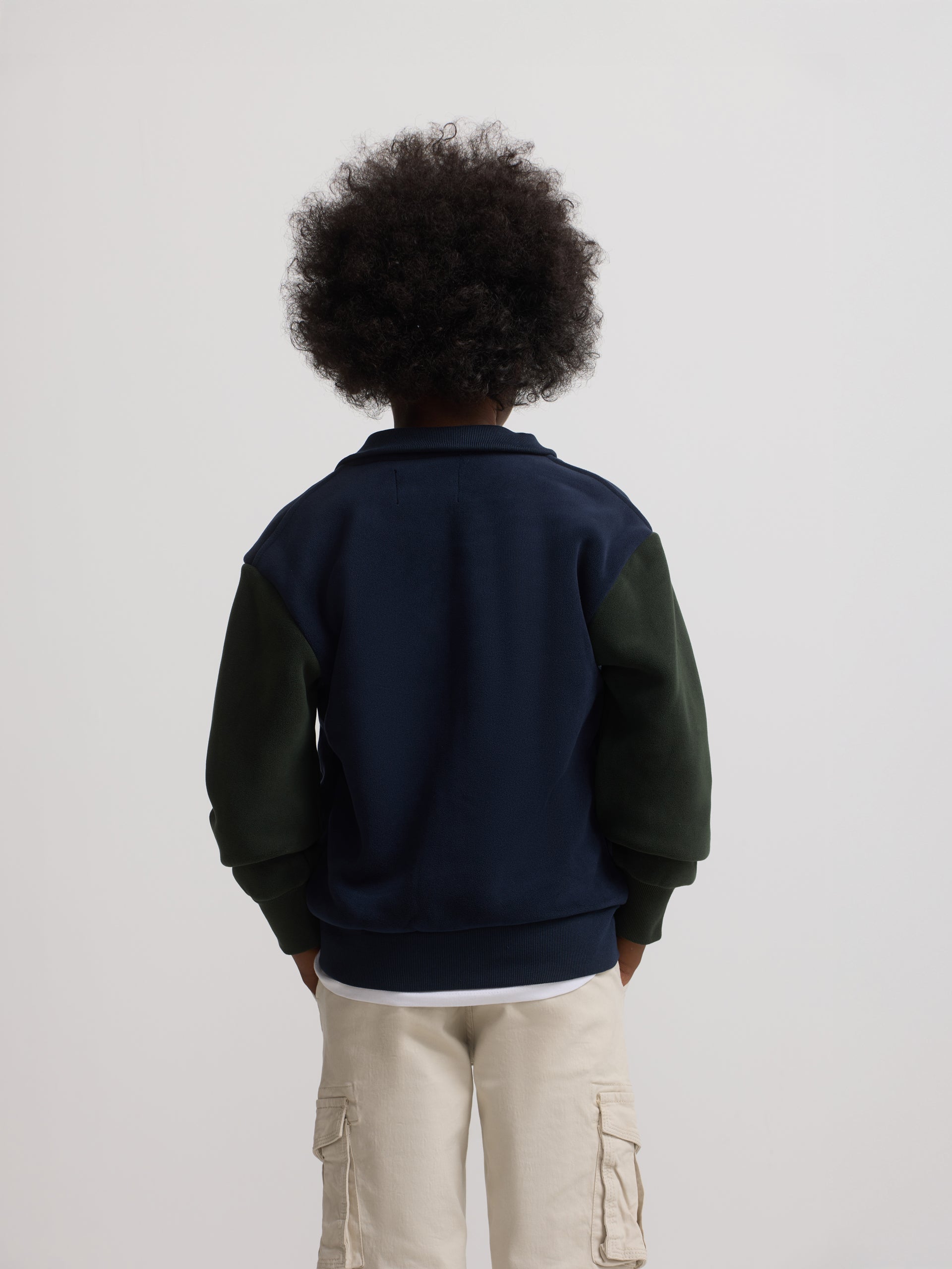 Kids' fantasy fleece jacket with navy blue sleeves