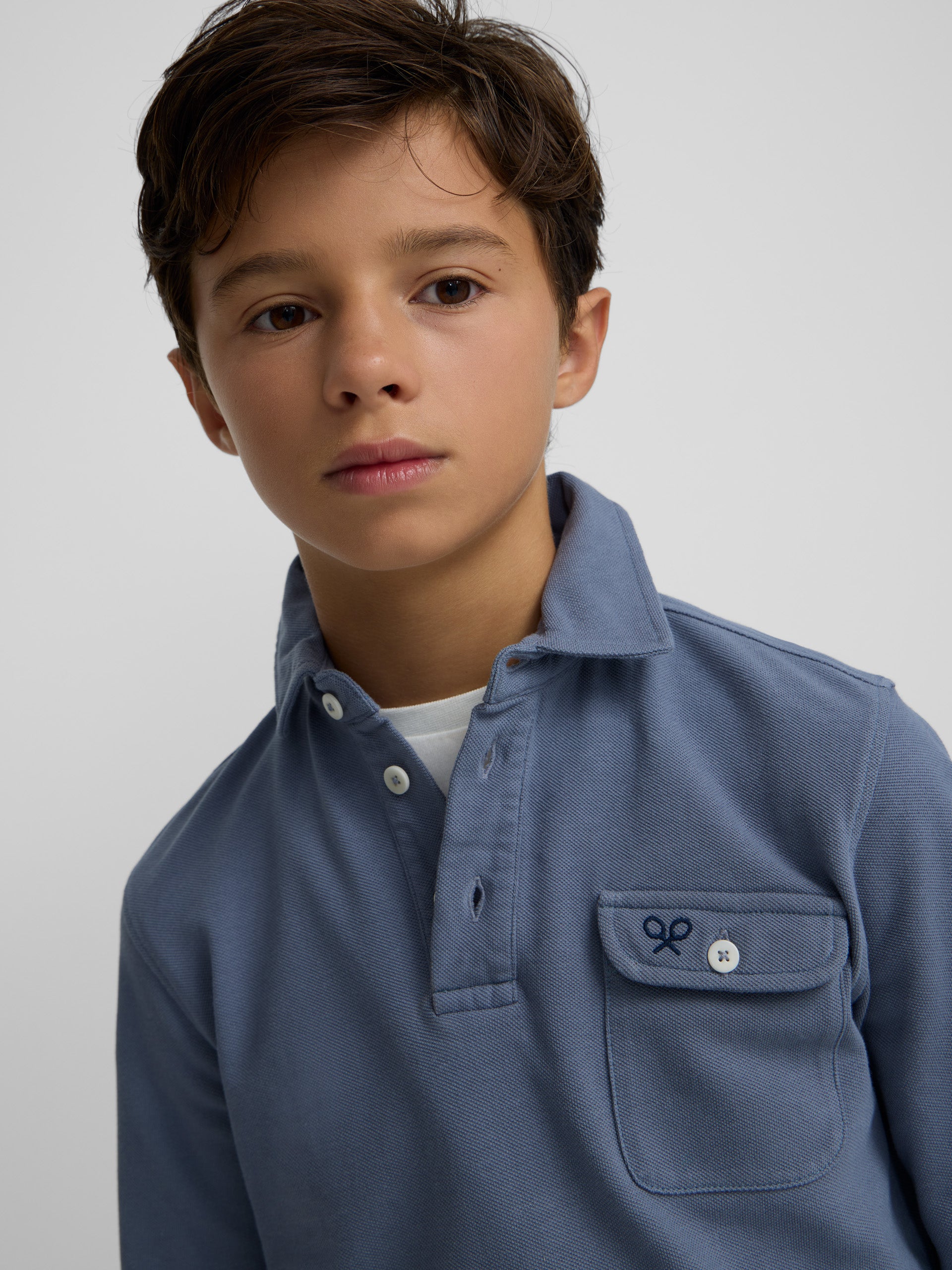 Polo kids manga larga bolsillo azul