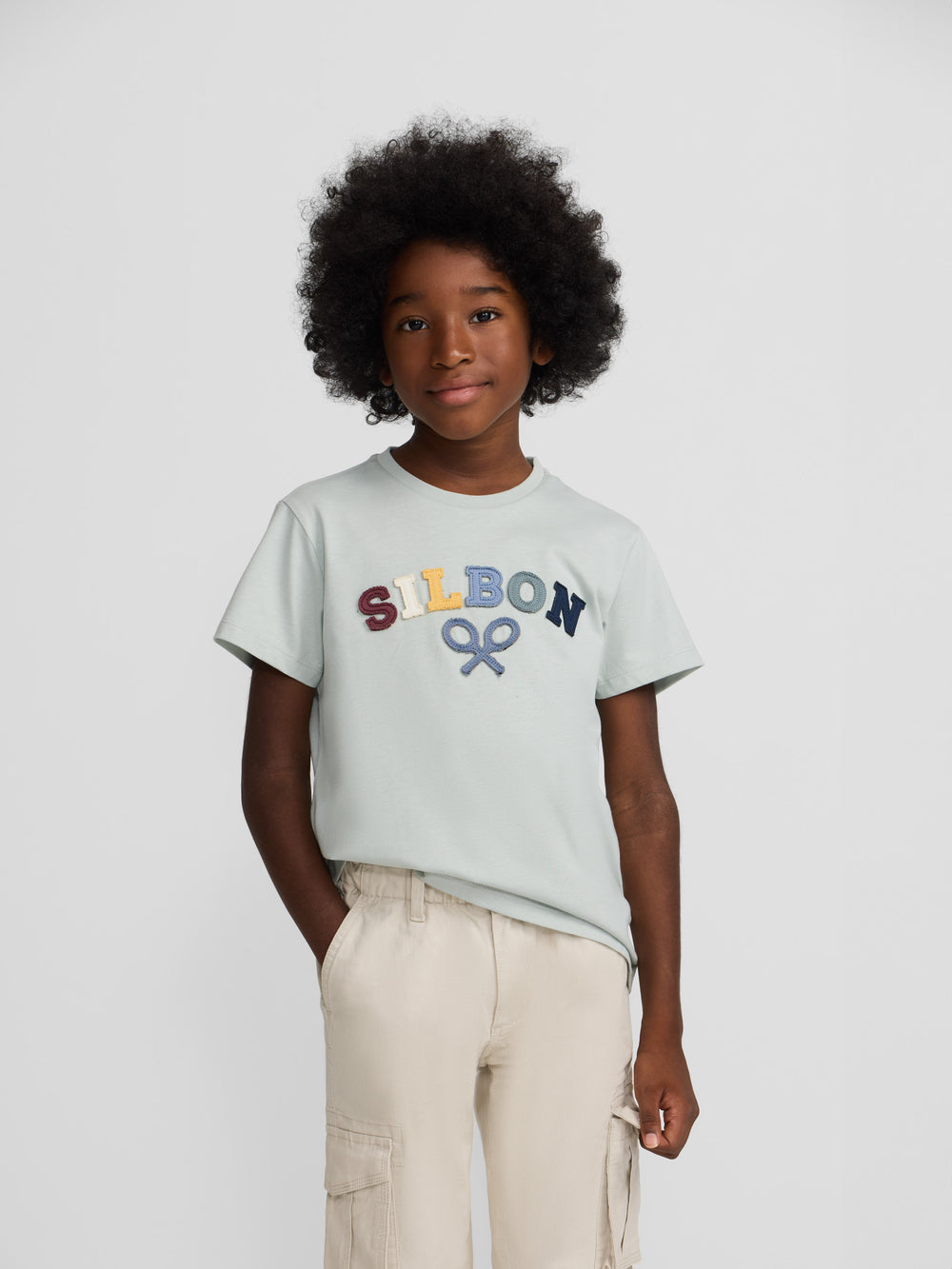 Kids' T-shirt with a multicolored green mid-racket