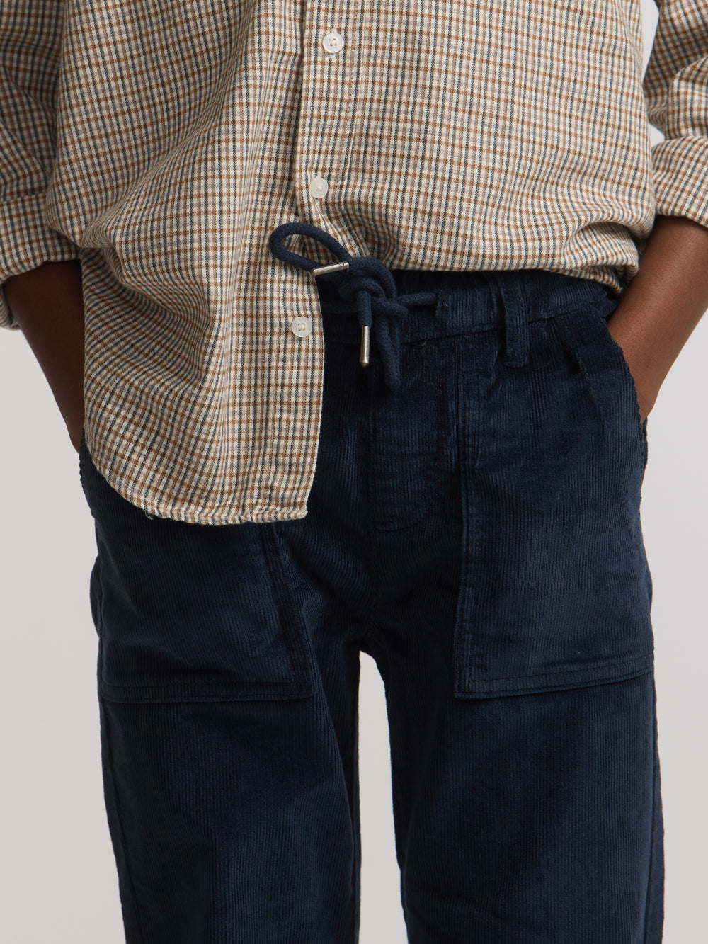 Kids' sport trousers with pockets, navy blue corduroy