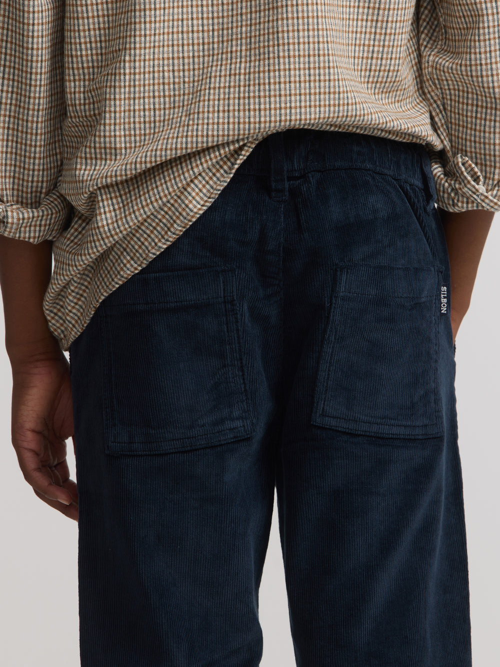 Kids' sport trousers with pockets, navy blue corduroy