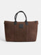 Leather travel bag with dark brown detail