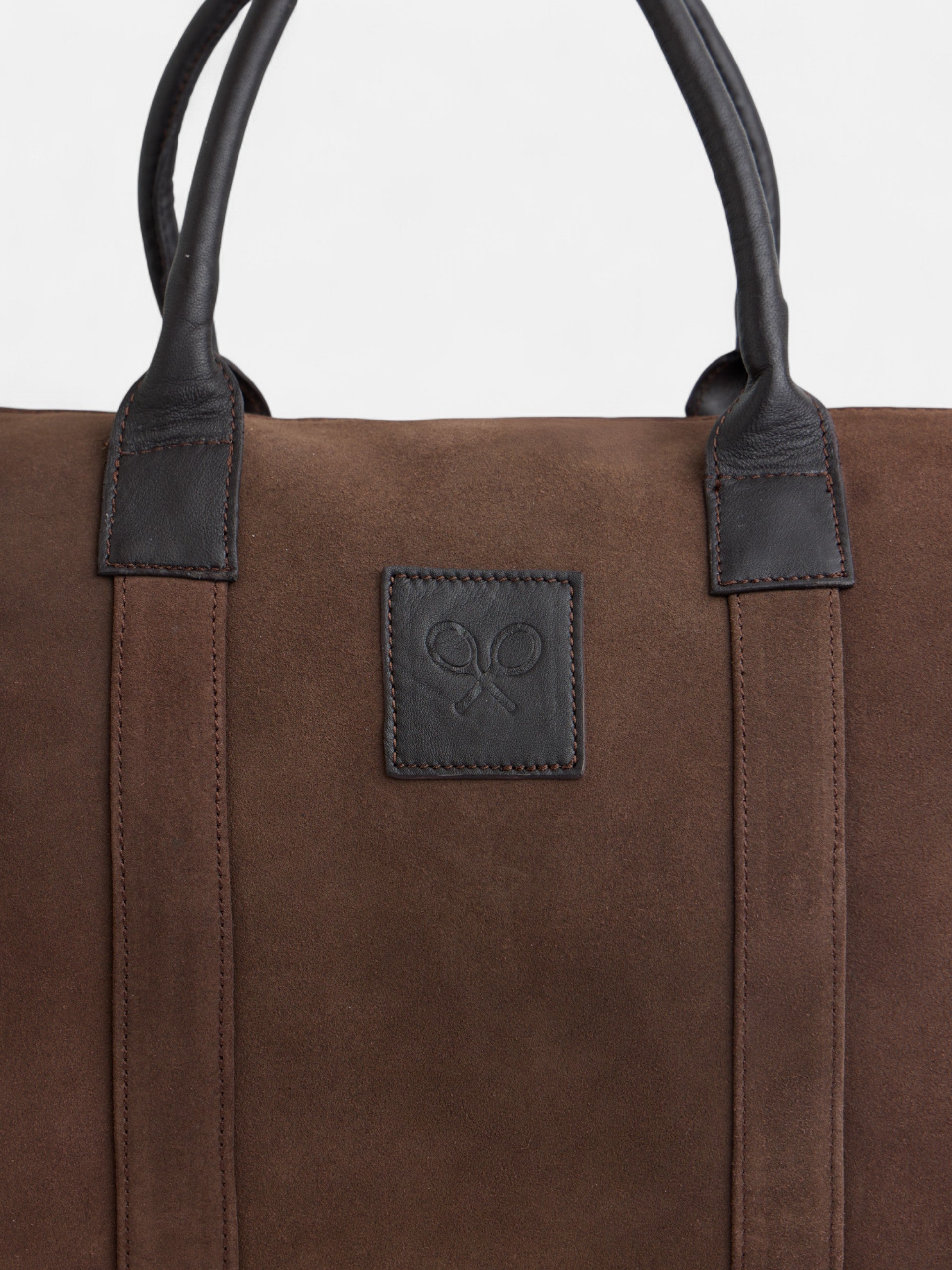 Leather travel bag with dark brown detail