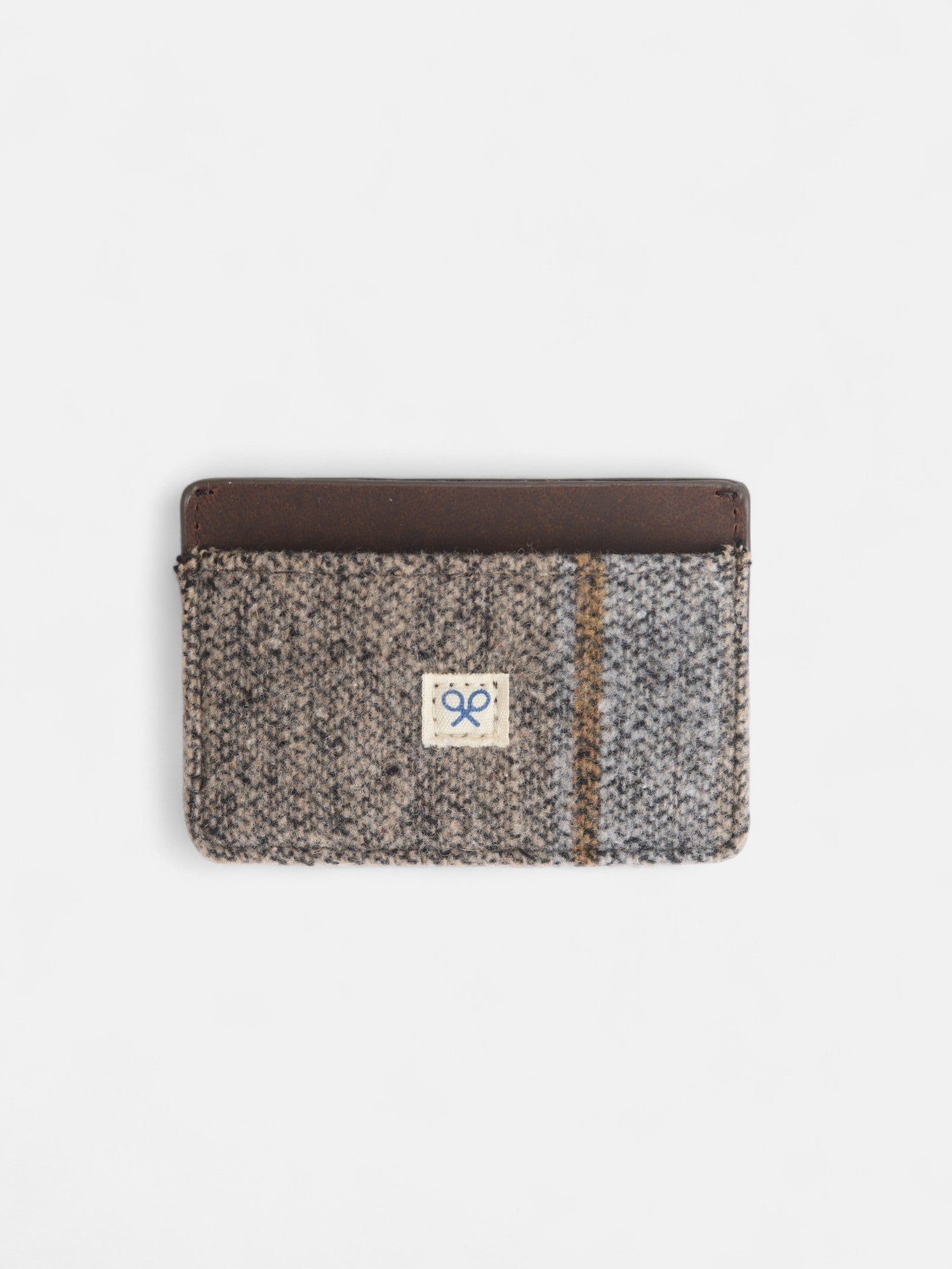 Porta-cartões em pele com padrão étnico azul-marinho