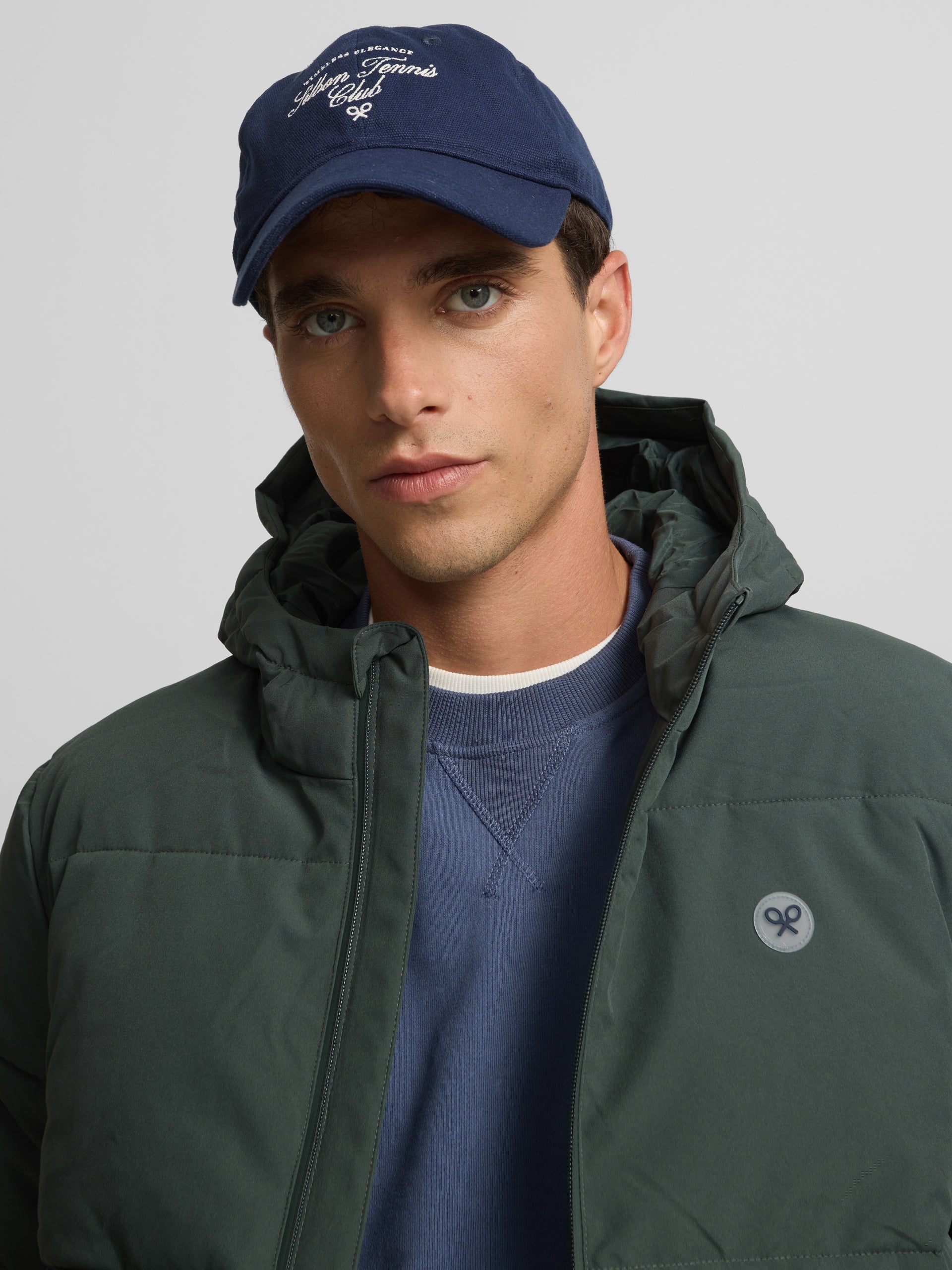 Manteau technique à capuche vert chaud