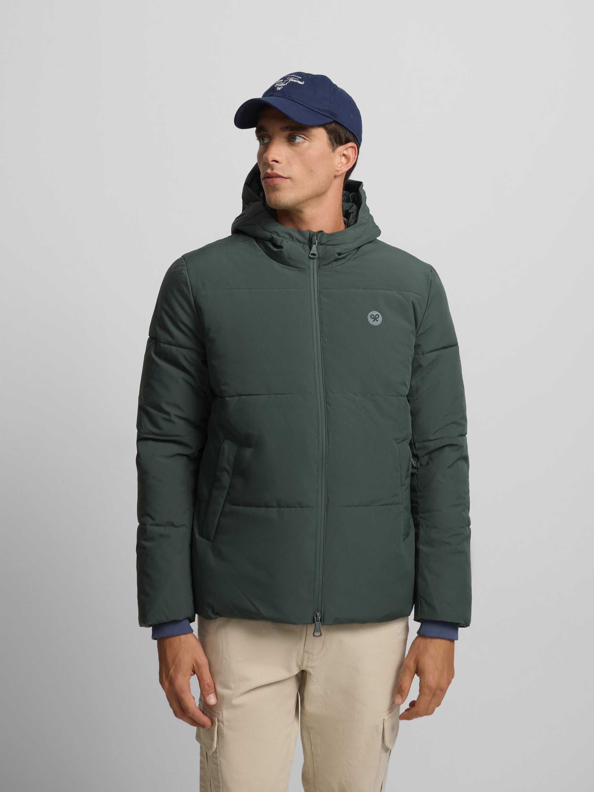 Manteau technique à capuche vert chaud