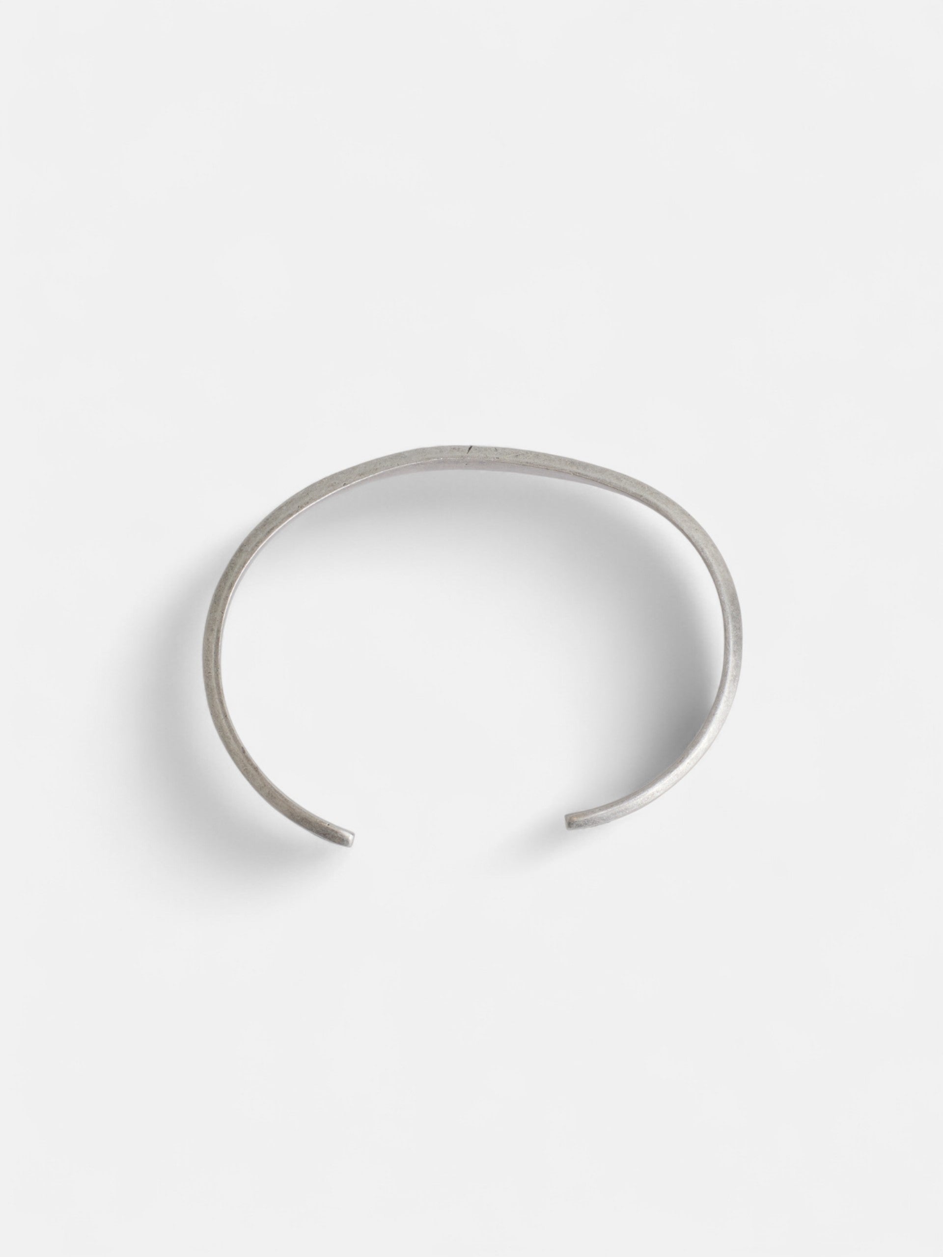 Pulsera metalica grabada