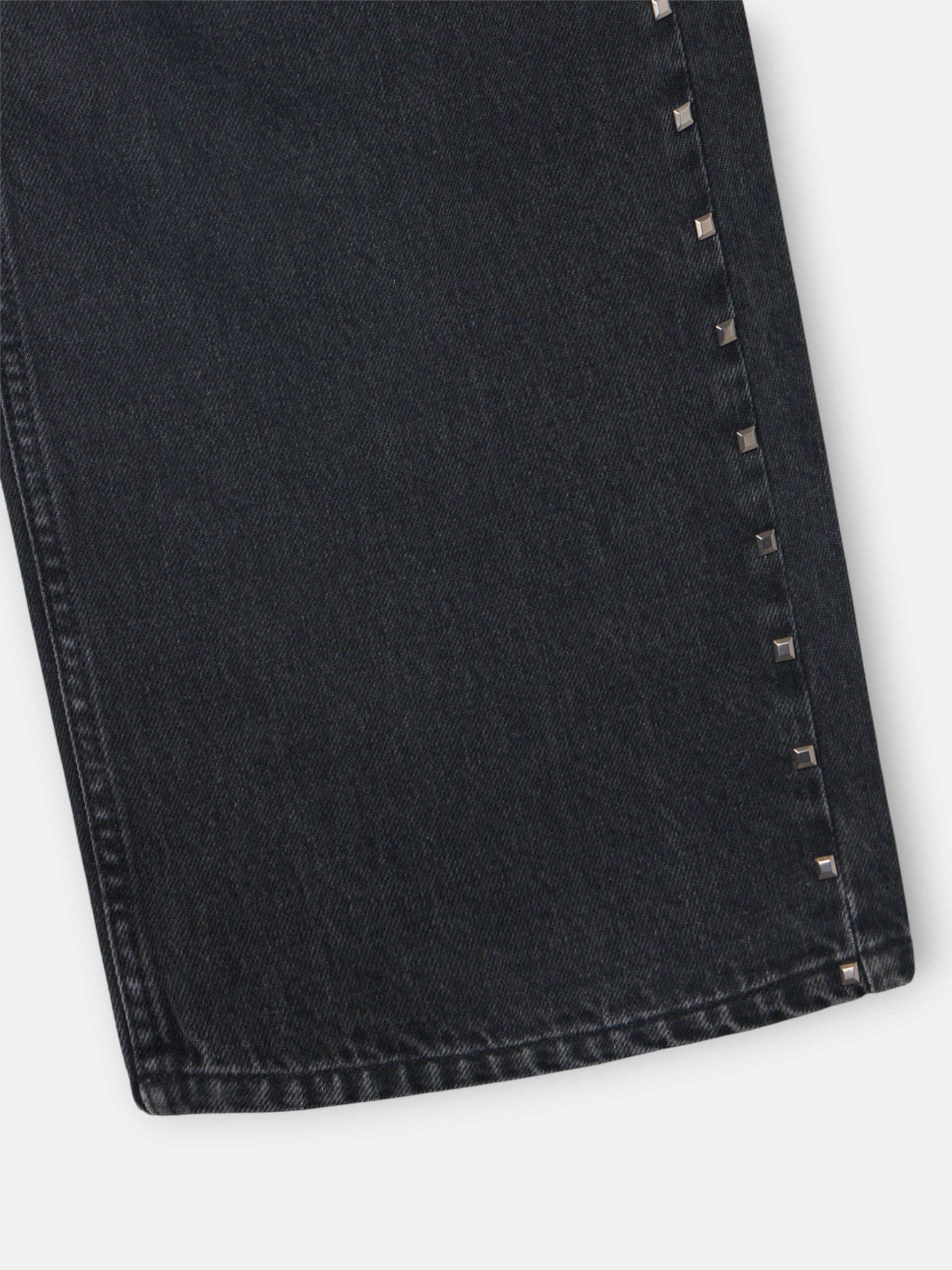 Pantalon denim tachas gris