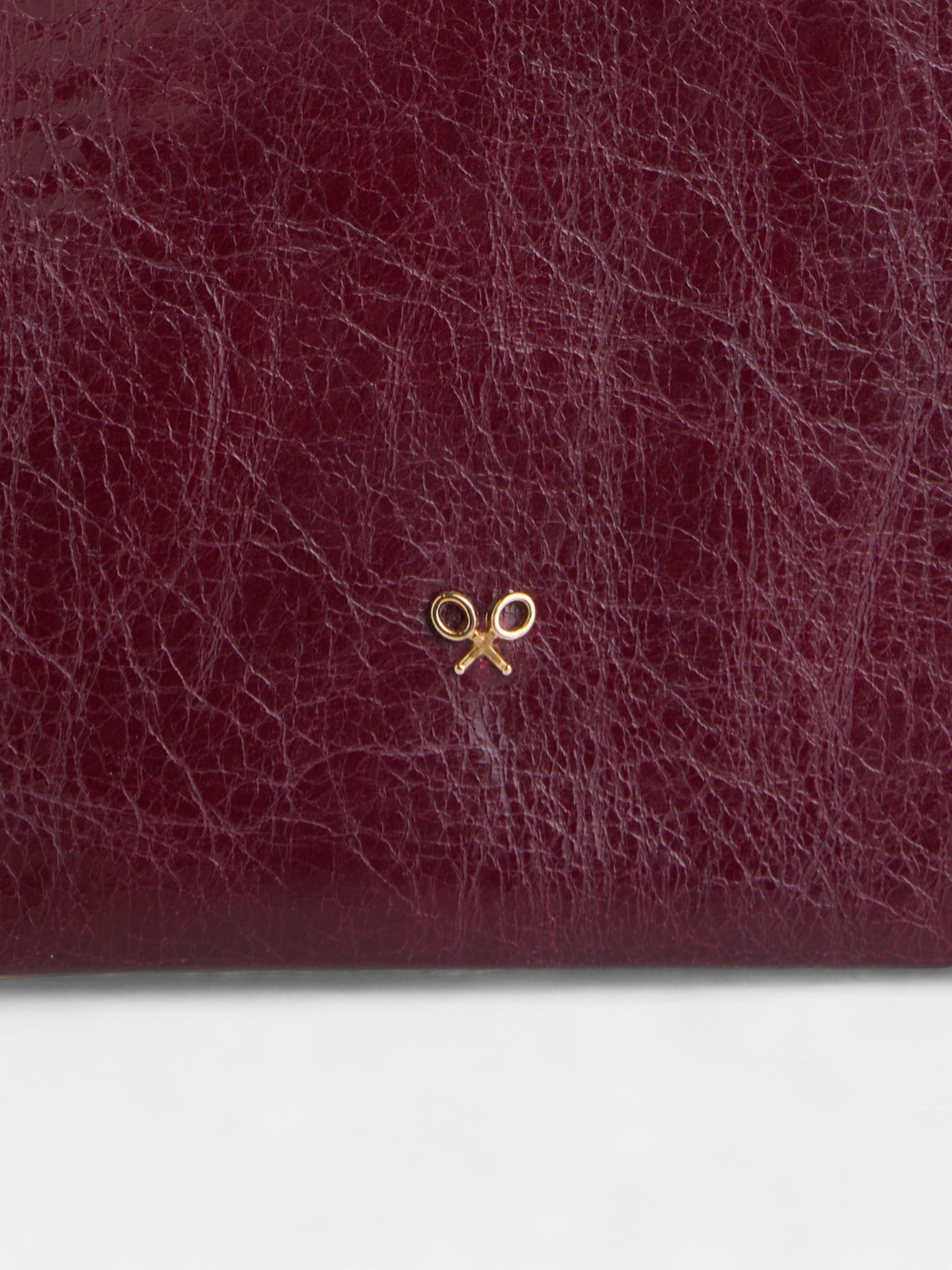 Portamovil piel cuerda etnica burdeos