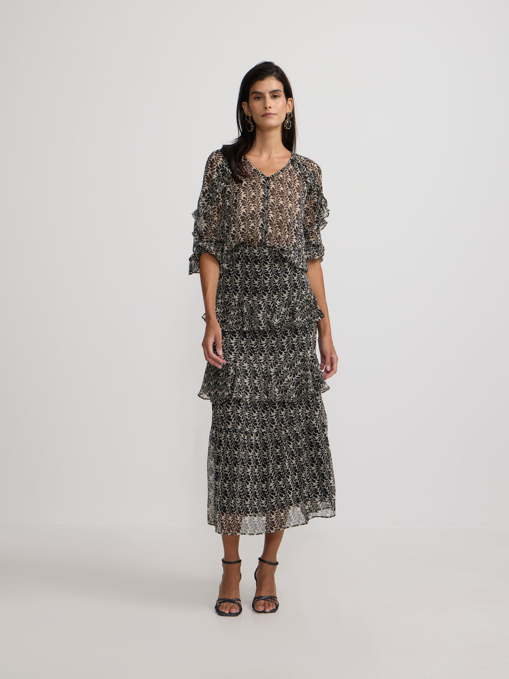 Blusa volantes estampado negros