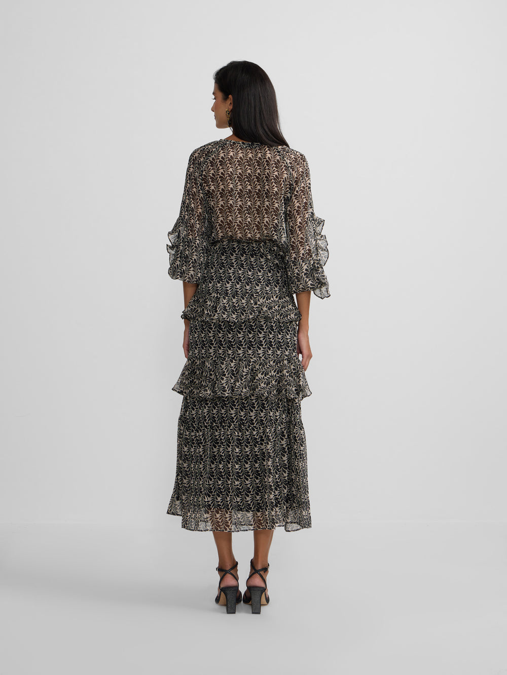 Blusa volantes estampado negros