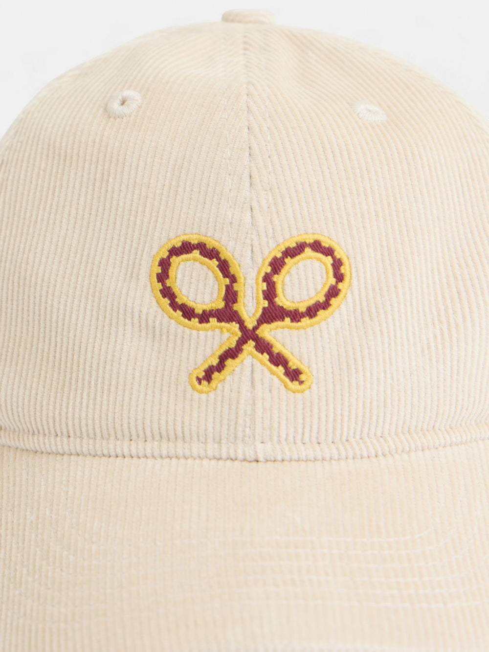 Women's cap with raw corduroy racket
