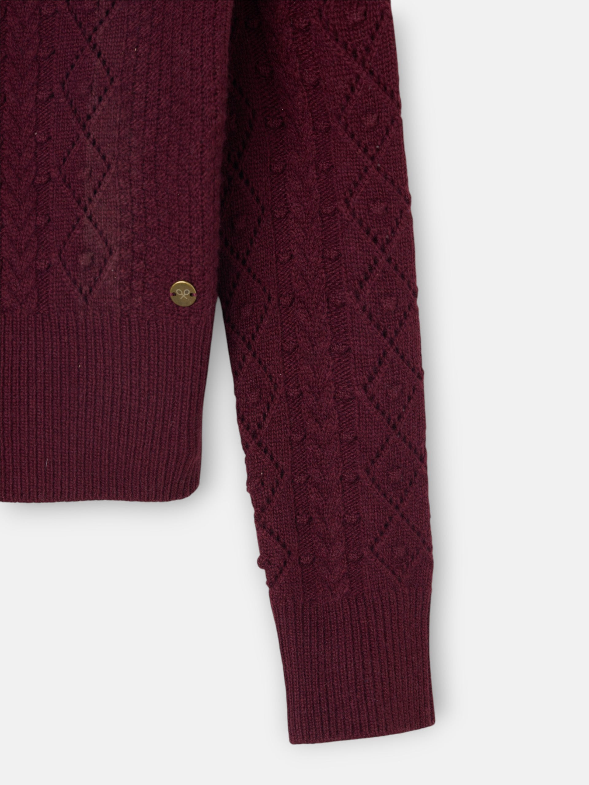 Cardigan en maille torsadée bordeaux