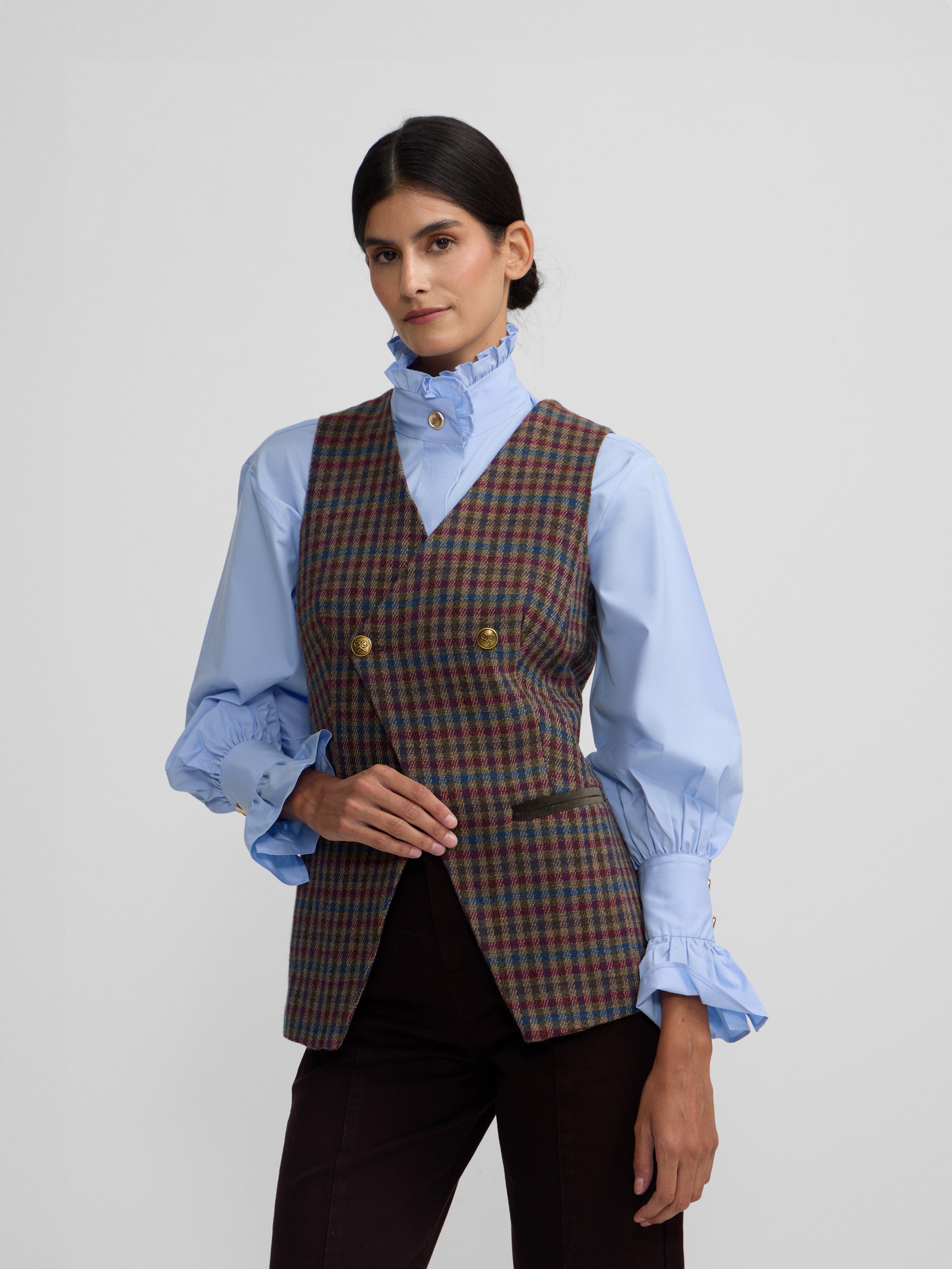 Colete cruzado clássico com padrão de quadrados verdes