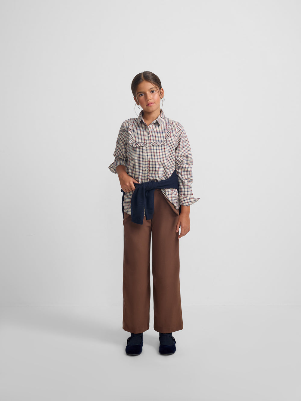 Girl's shirt with blue and red checkered ruffle