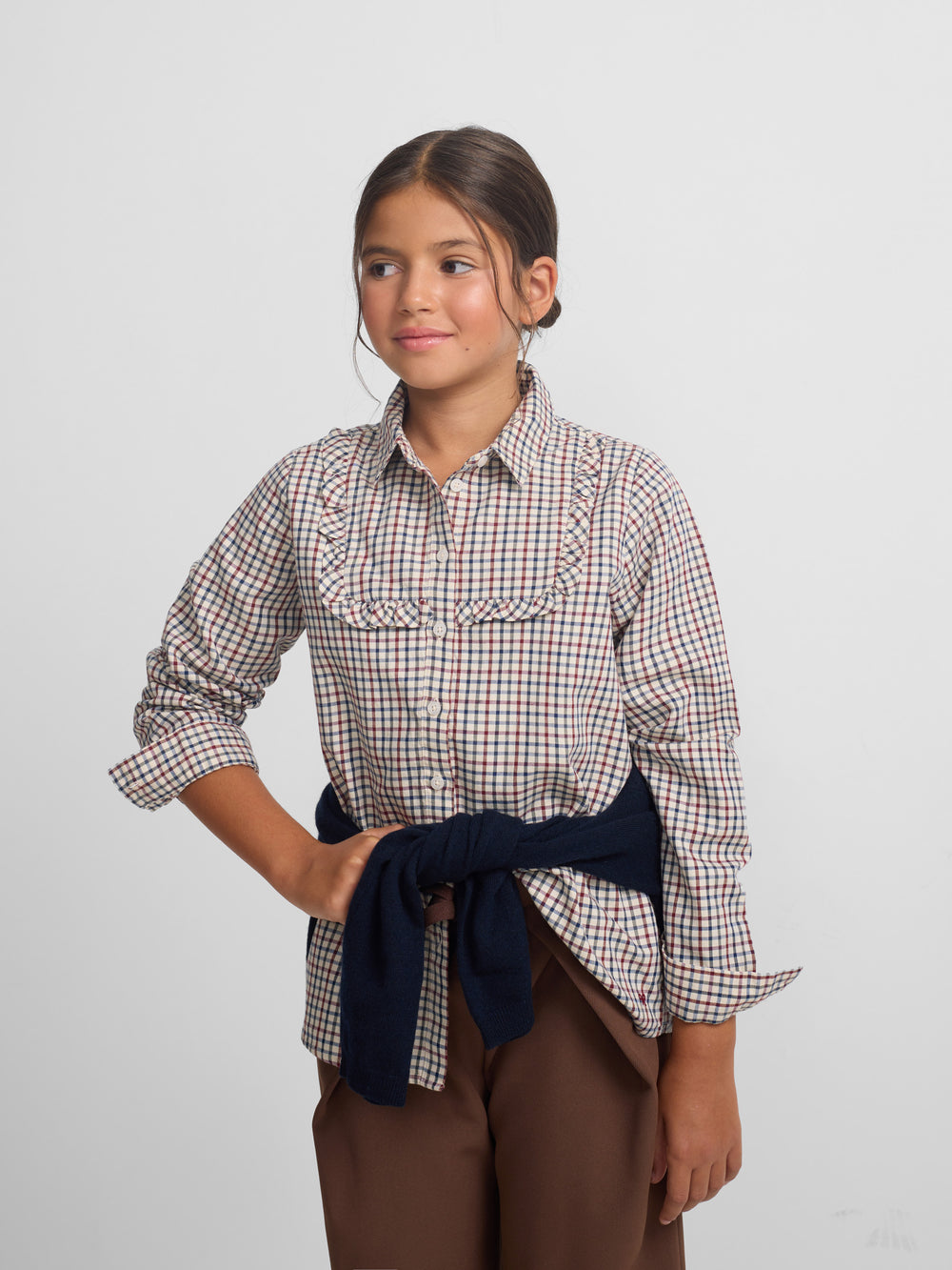 Girl's shirt with blue and red checkered ruffle