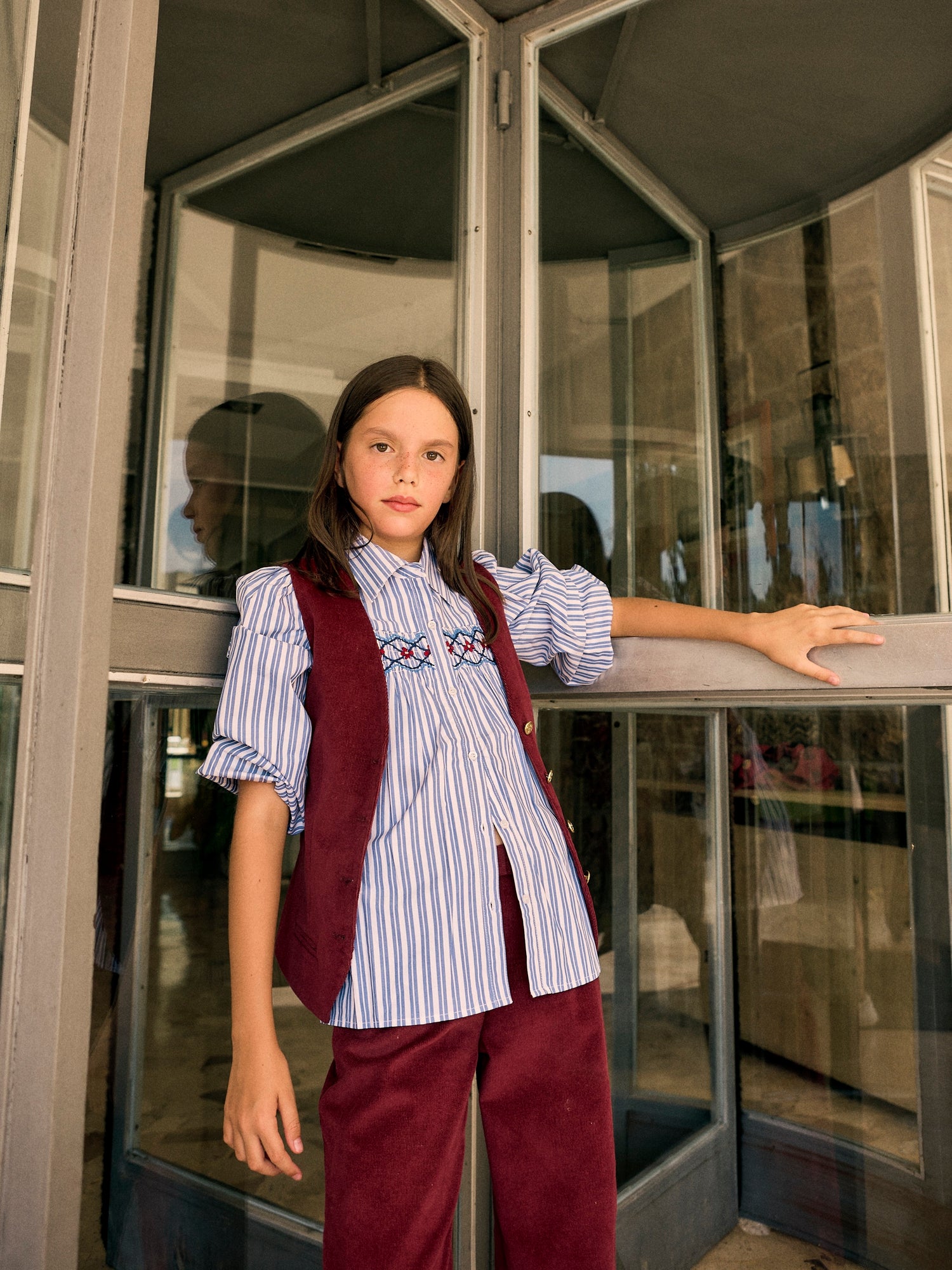 Blue and white striped gathered girl's shirt