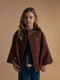 Girl's cape with brown checkered leather details
