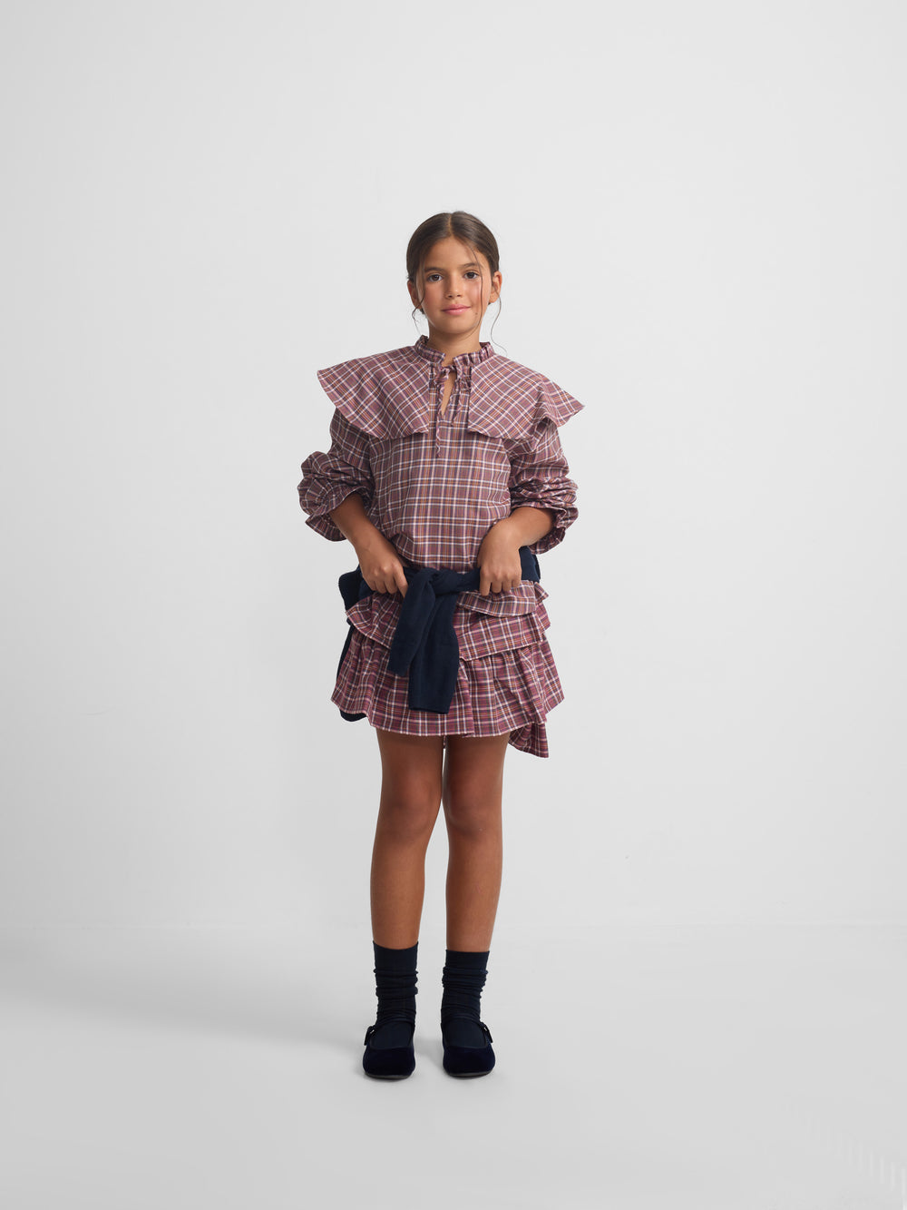 Girl's blouse with purple and pink checkered ruffles