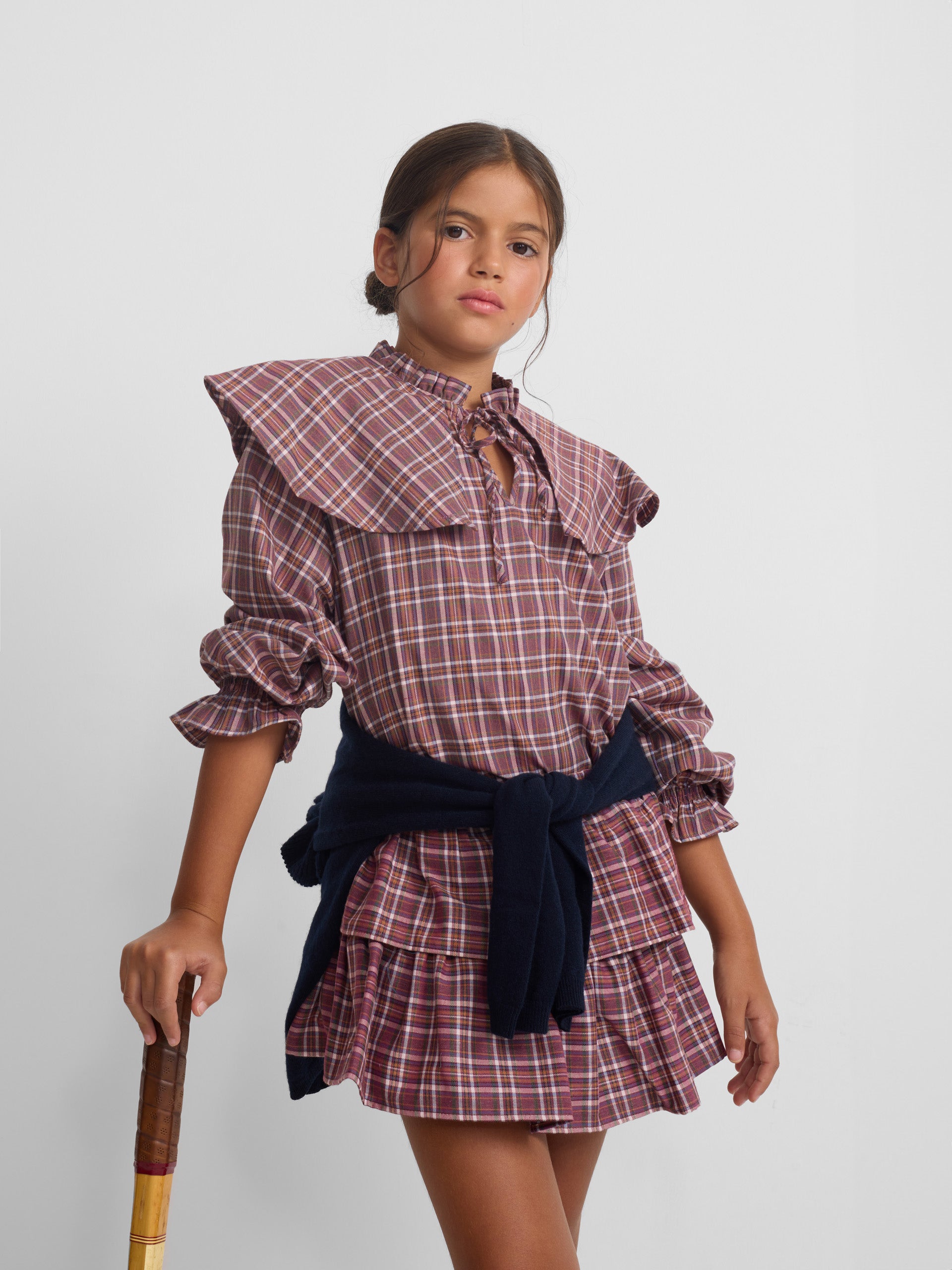 Girl's blouse with purple and pink checkered ruffles