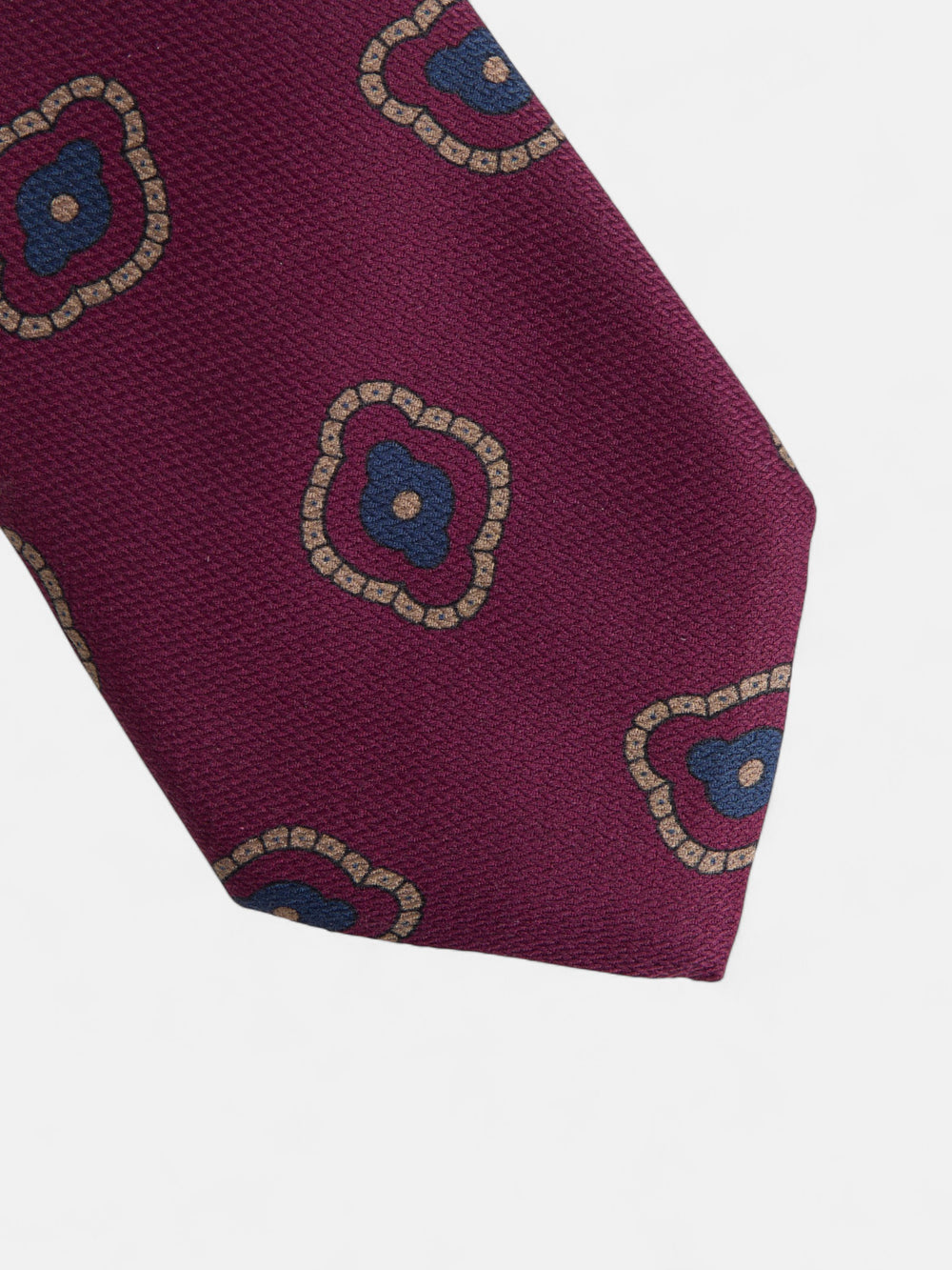 Gravata com padrão geométrico irregular em bordô