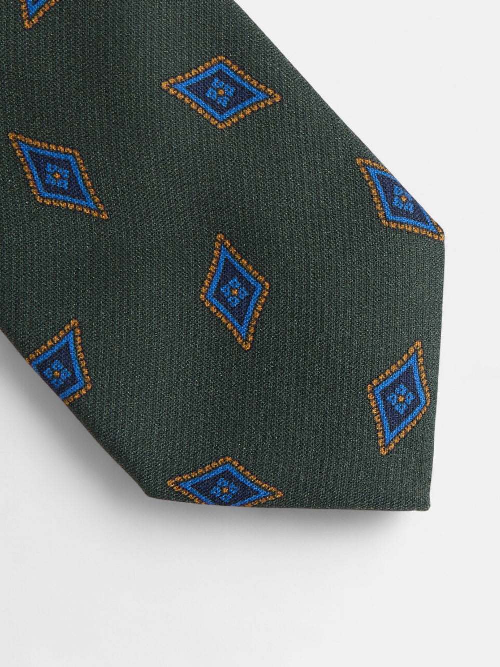 Gravata com padrão de losangos verdes