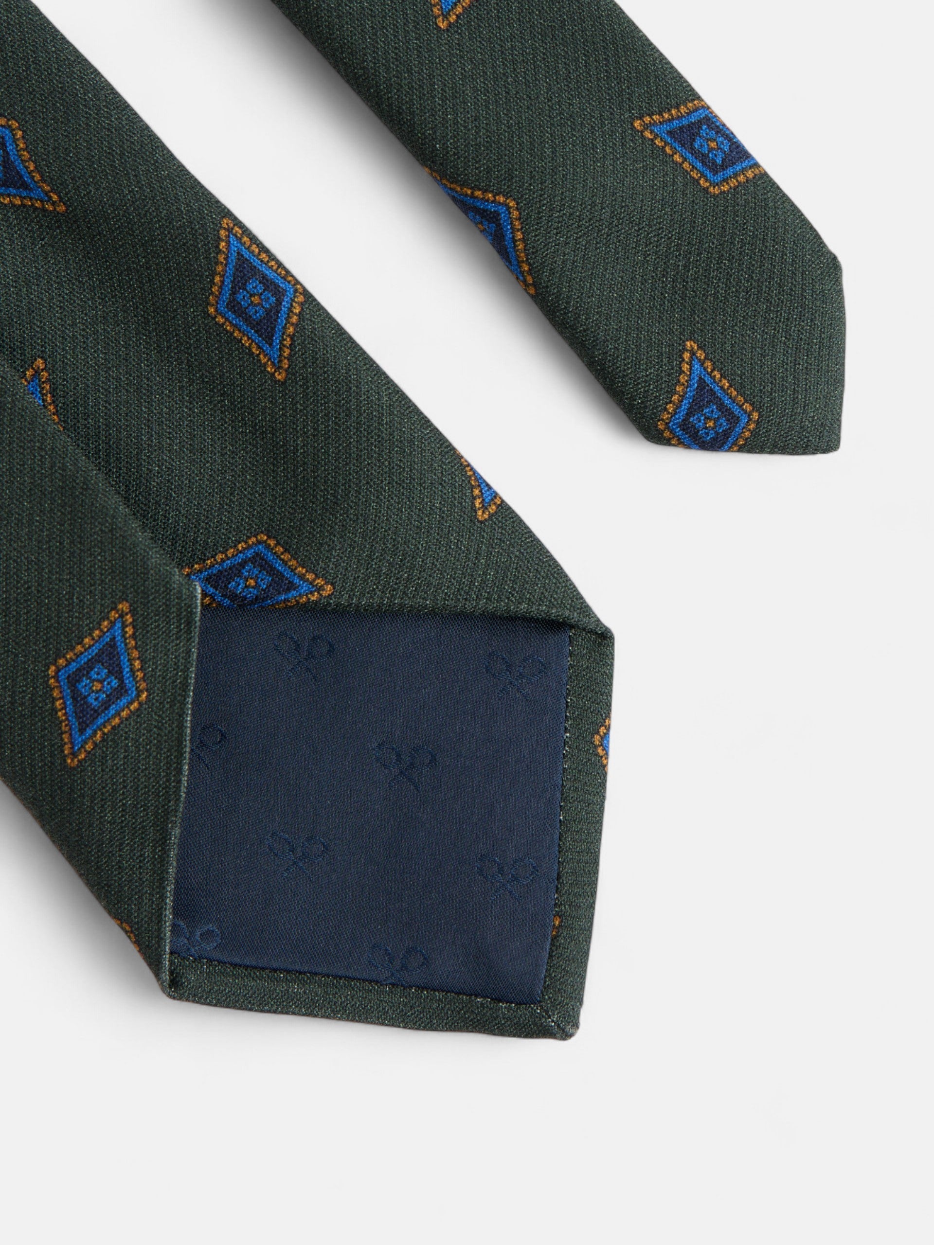 Gravata com padrão de losangos verdes