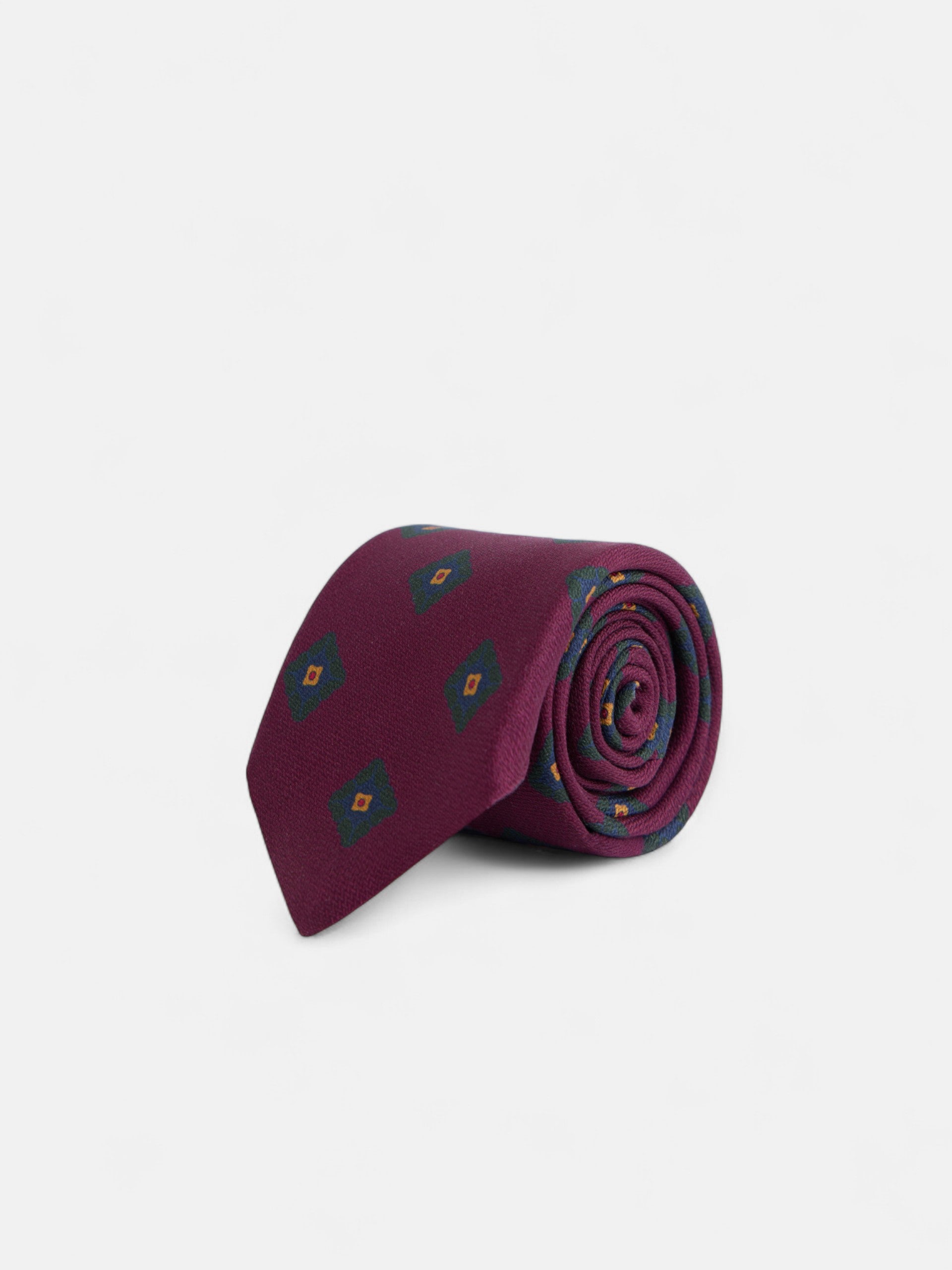 Corbata seda motivo geometrico burdeos