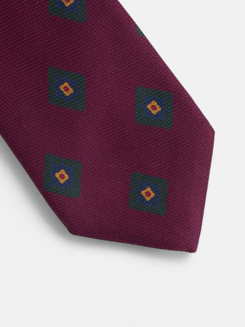 Corbata seda motivo geometrico burdeos