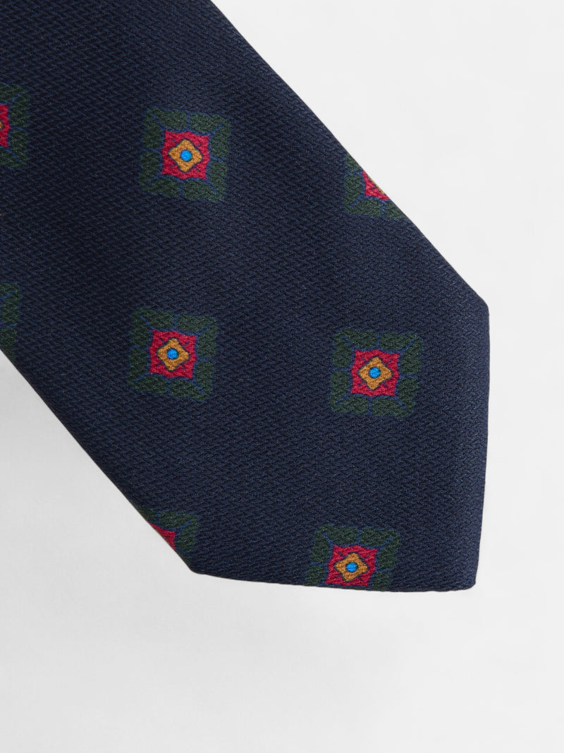 Corbata seda motivo geometrico azul marino