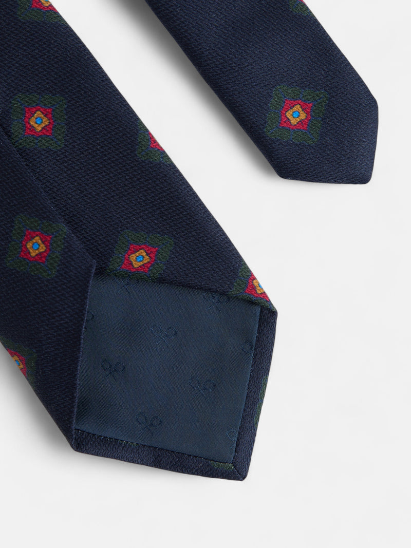 Corbata seda motivo geometrico azul marino
