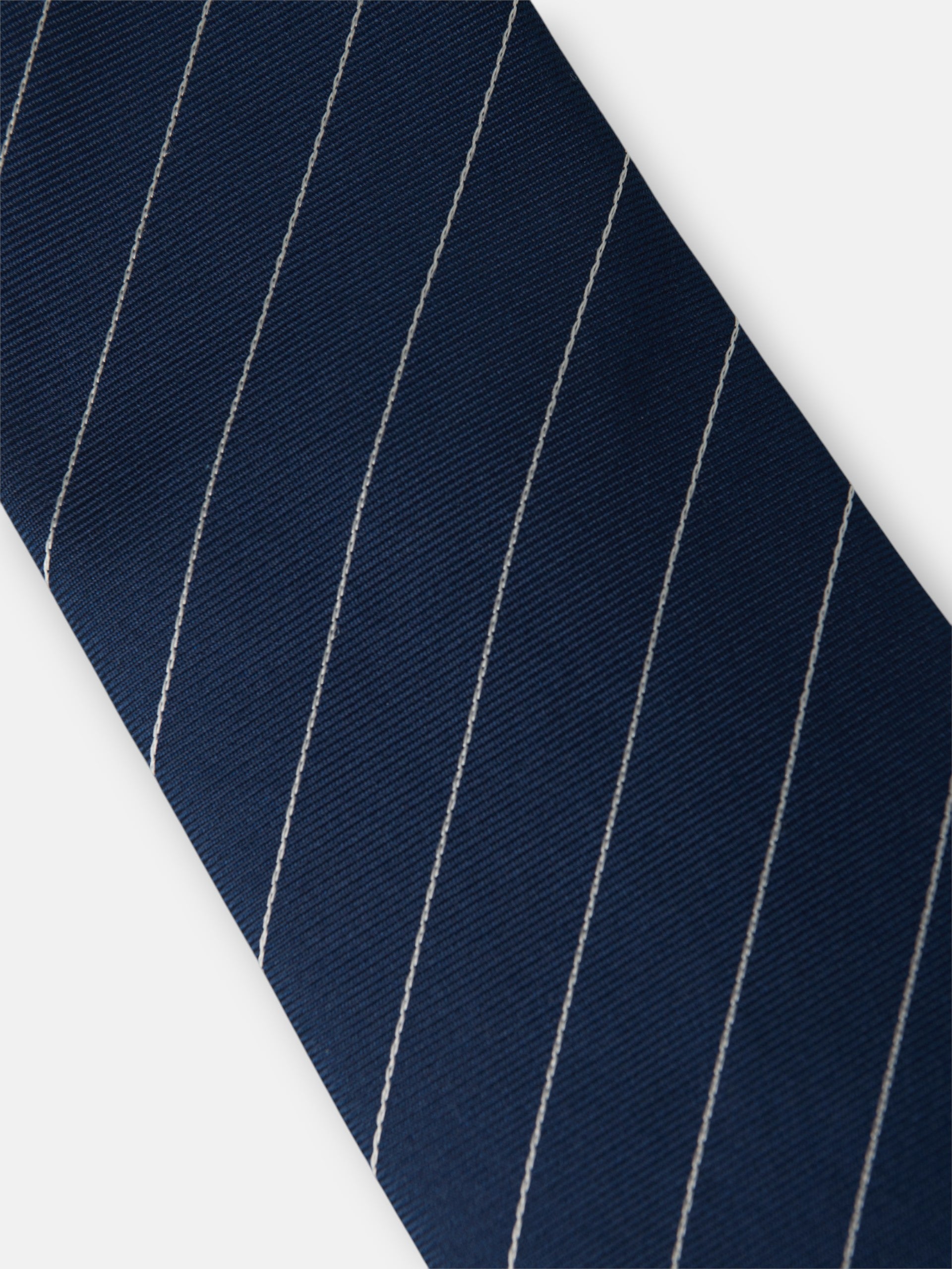 Corbata mini rayas raqueta azul marino