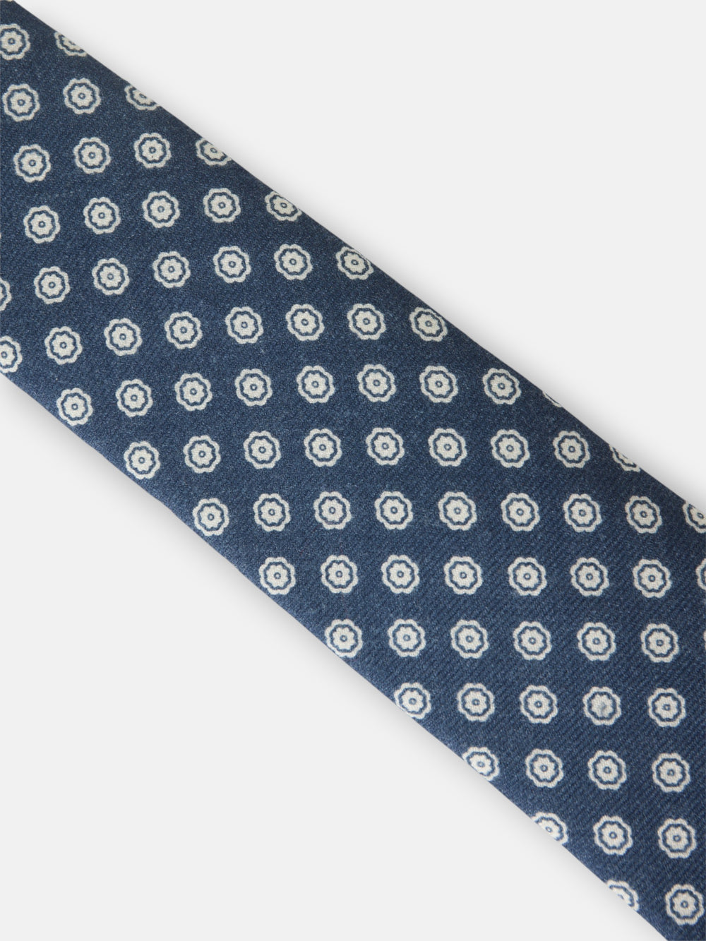 Corbata motivo flor azul marino