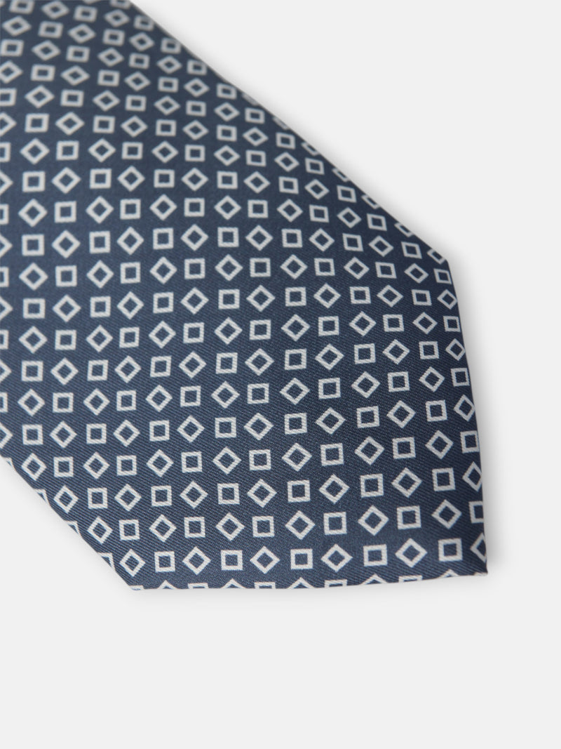 Cravate à motif carreaux irréguliers bleu marine