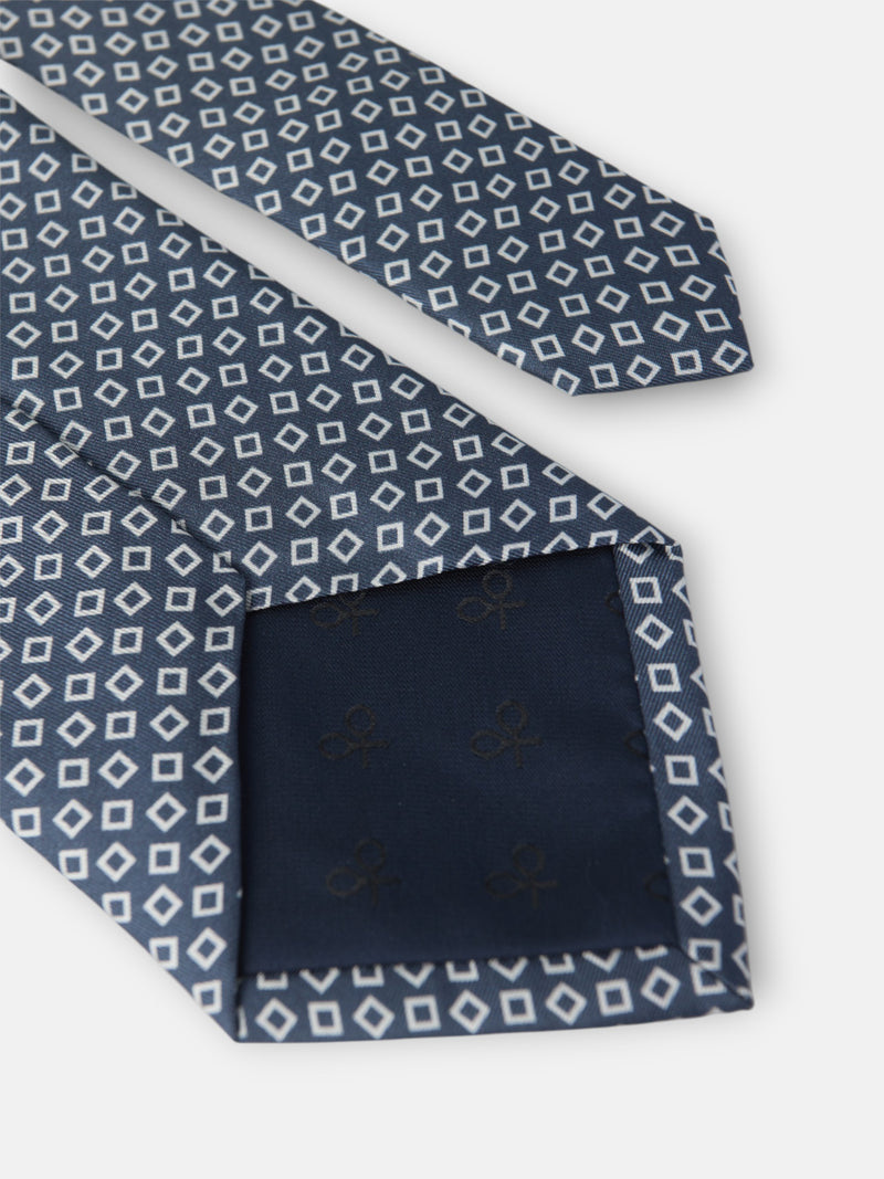 Cravate à motif carreaux irréguliers bleu marine