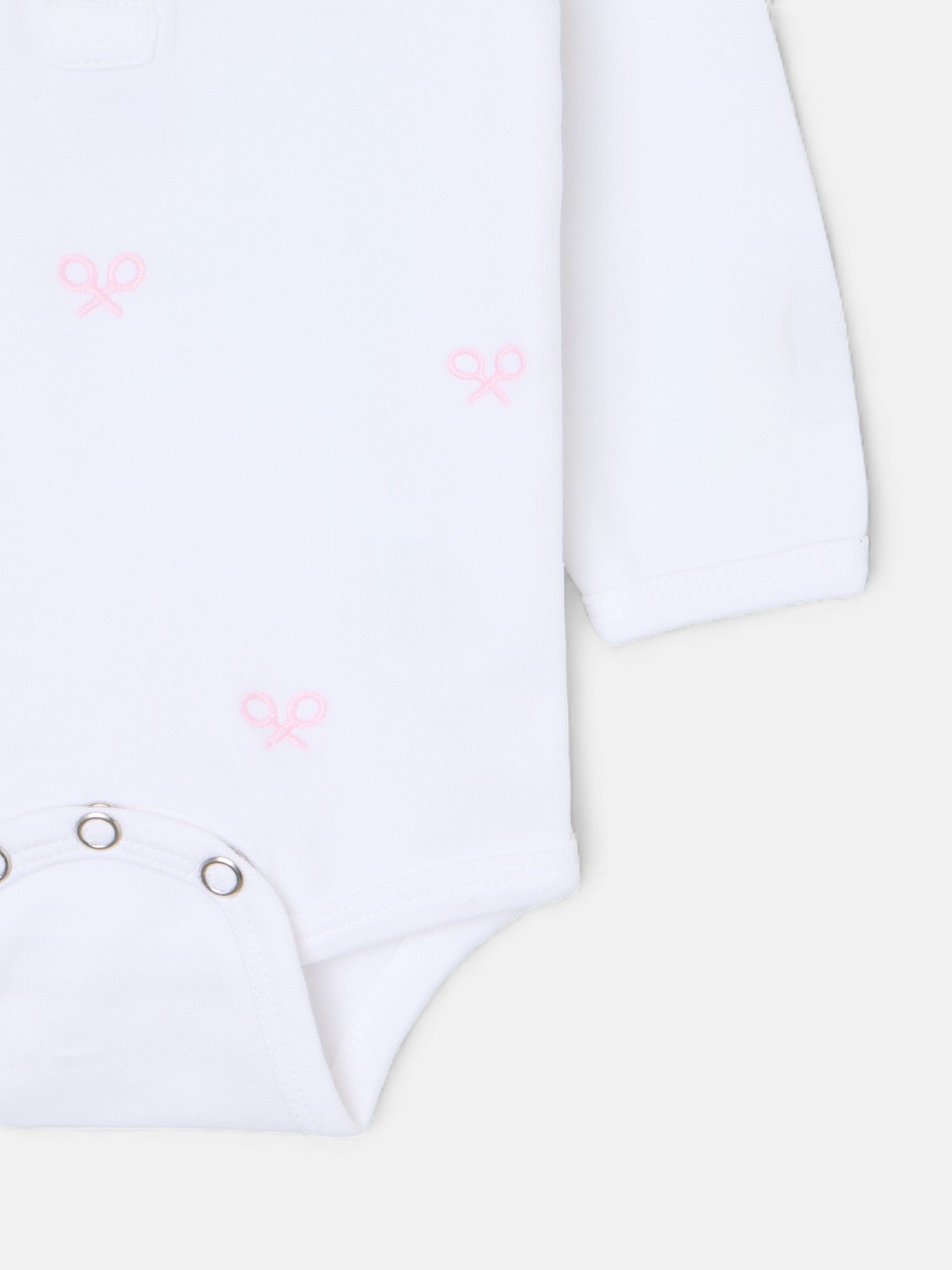 body bébé rose à manches longues avec plusieurs raquettes