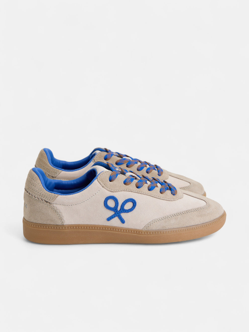 Beige and blue racket shoe