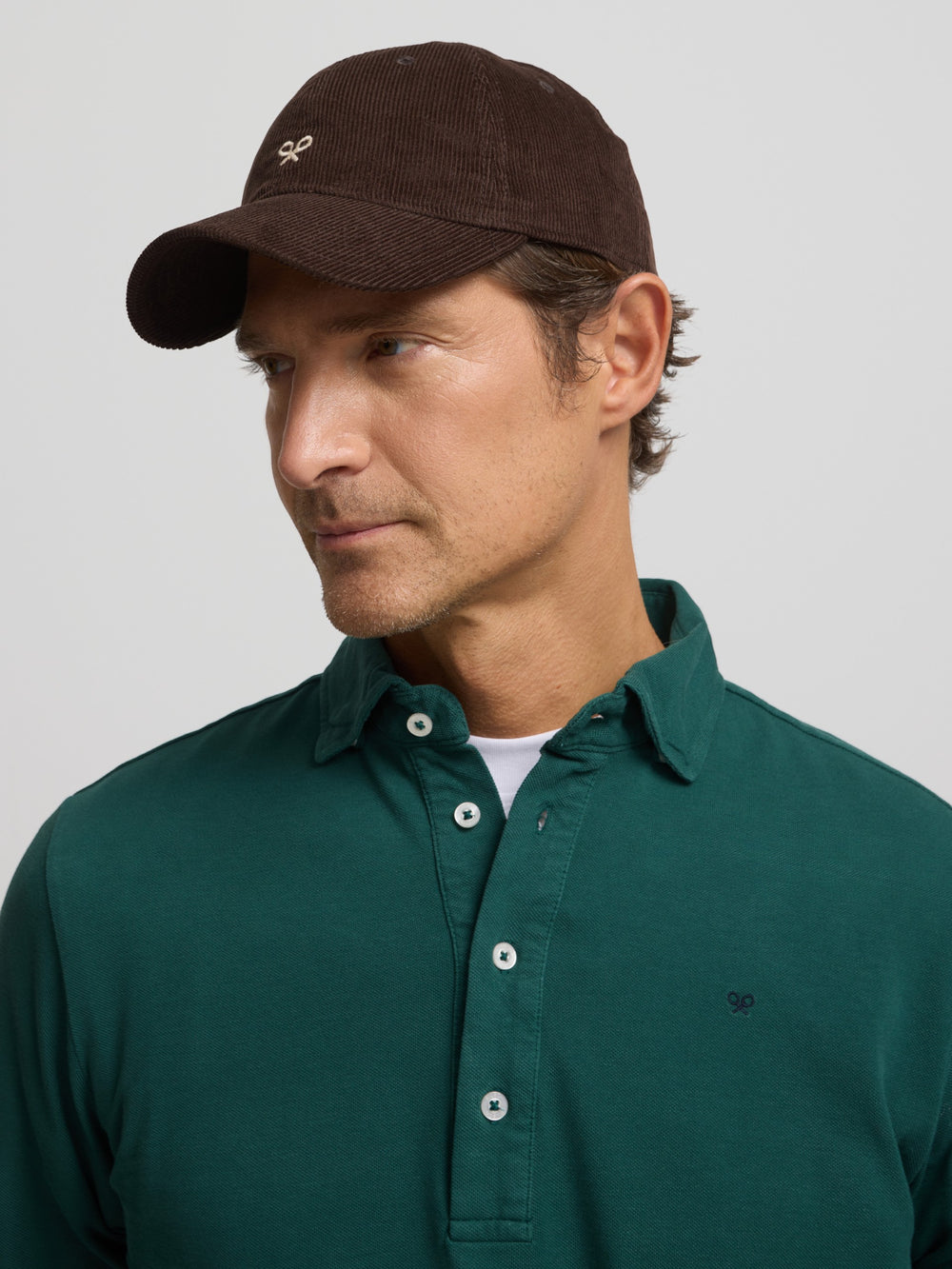 Plain dark green long-sleeved polo shirt
