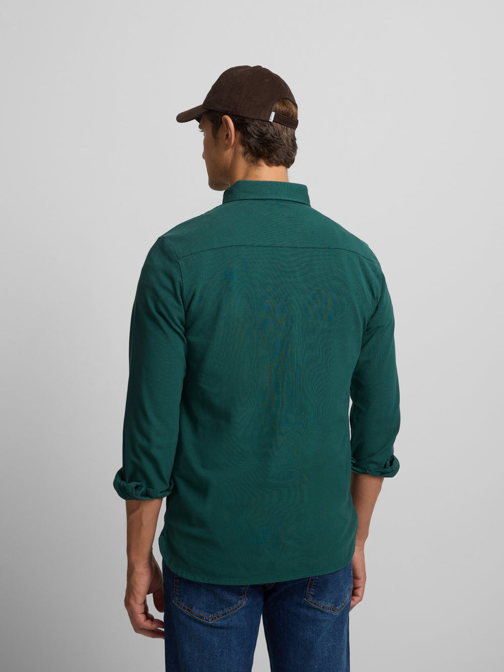 Plain dark green long-sleeved polo shirt