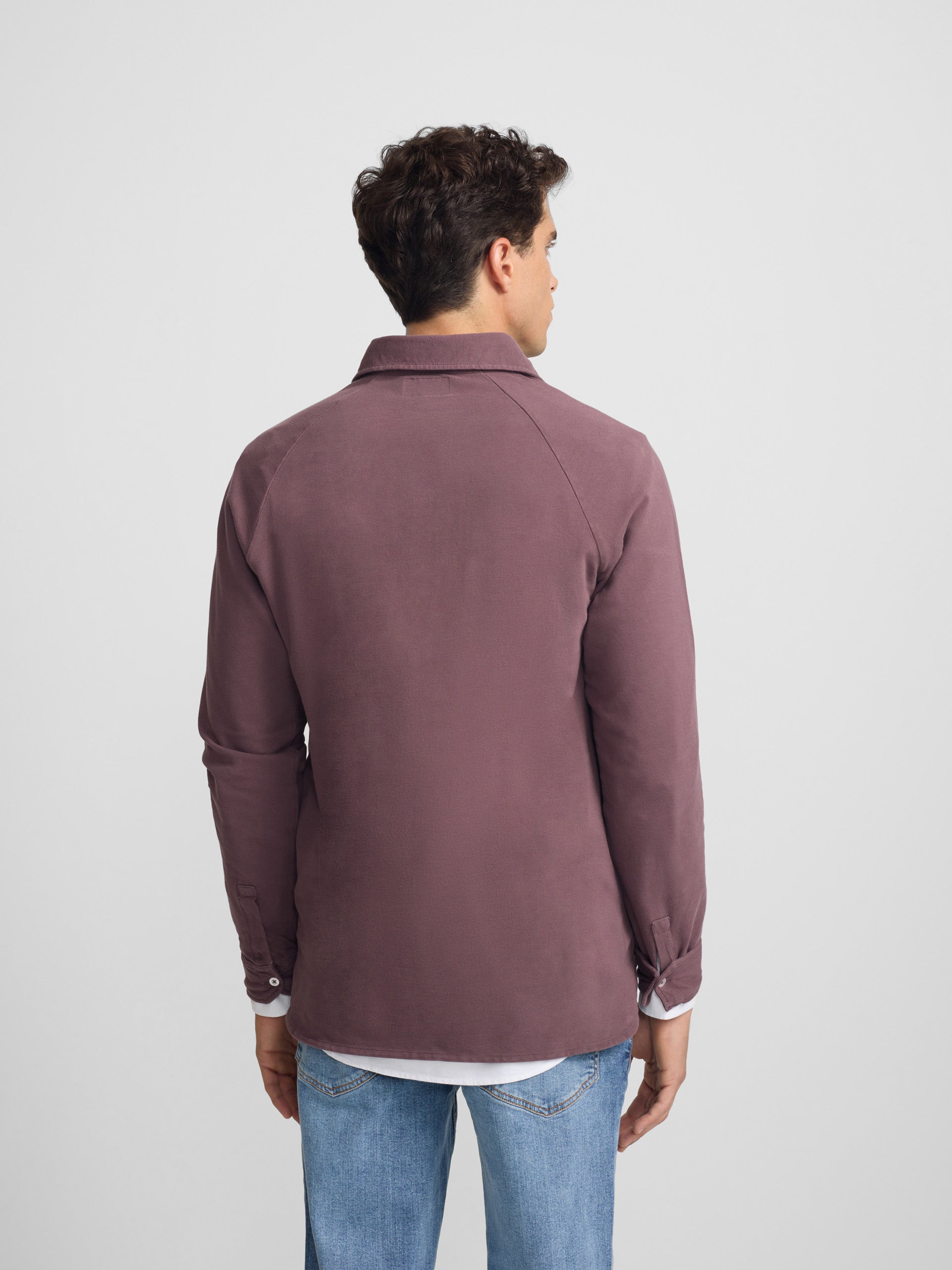 Polo liso de manga comprida raglã bordô