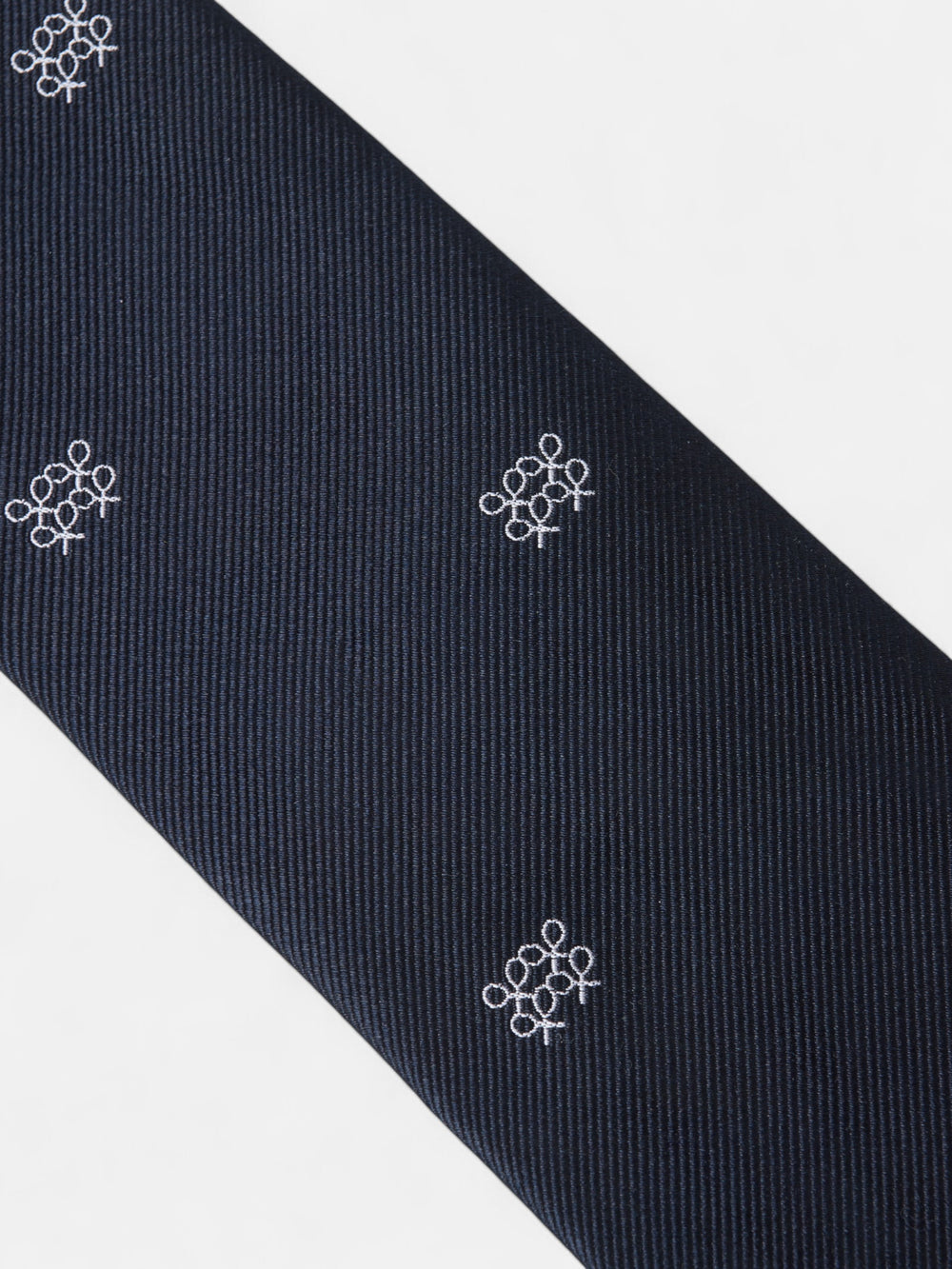 Gravata com padrão geométrico de raquetes azul-marinho