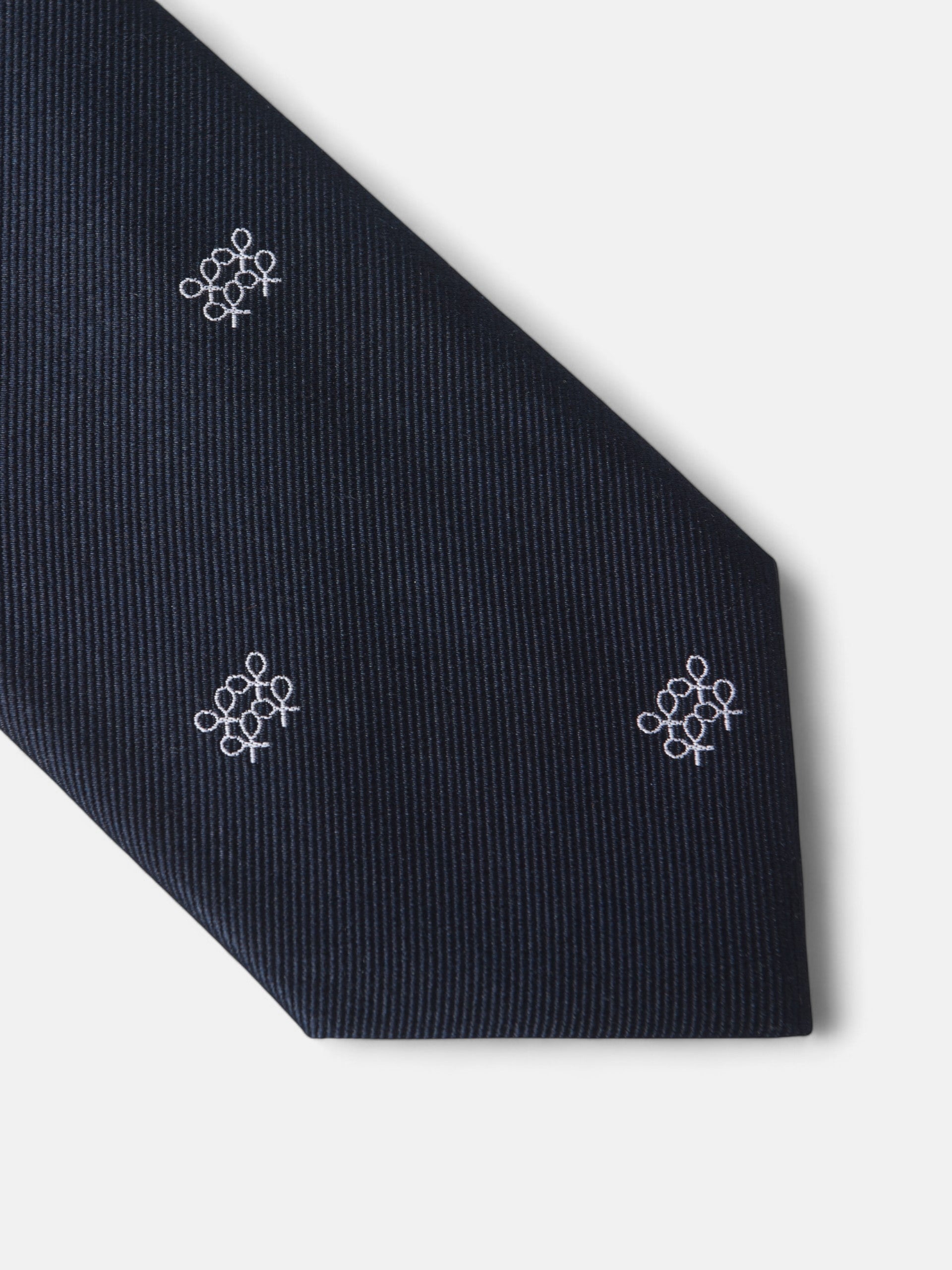 Gravata com padrão geométrico de raquetes azul-marinho