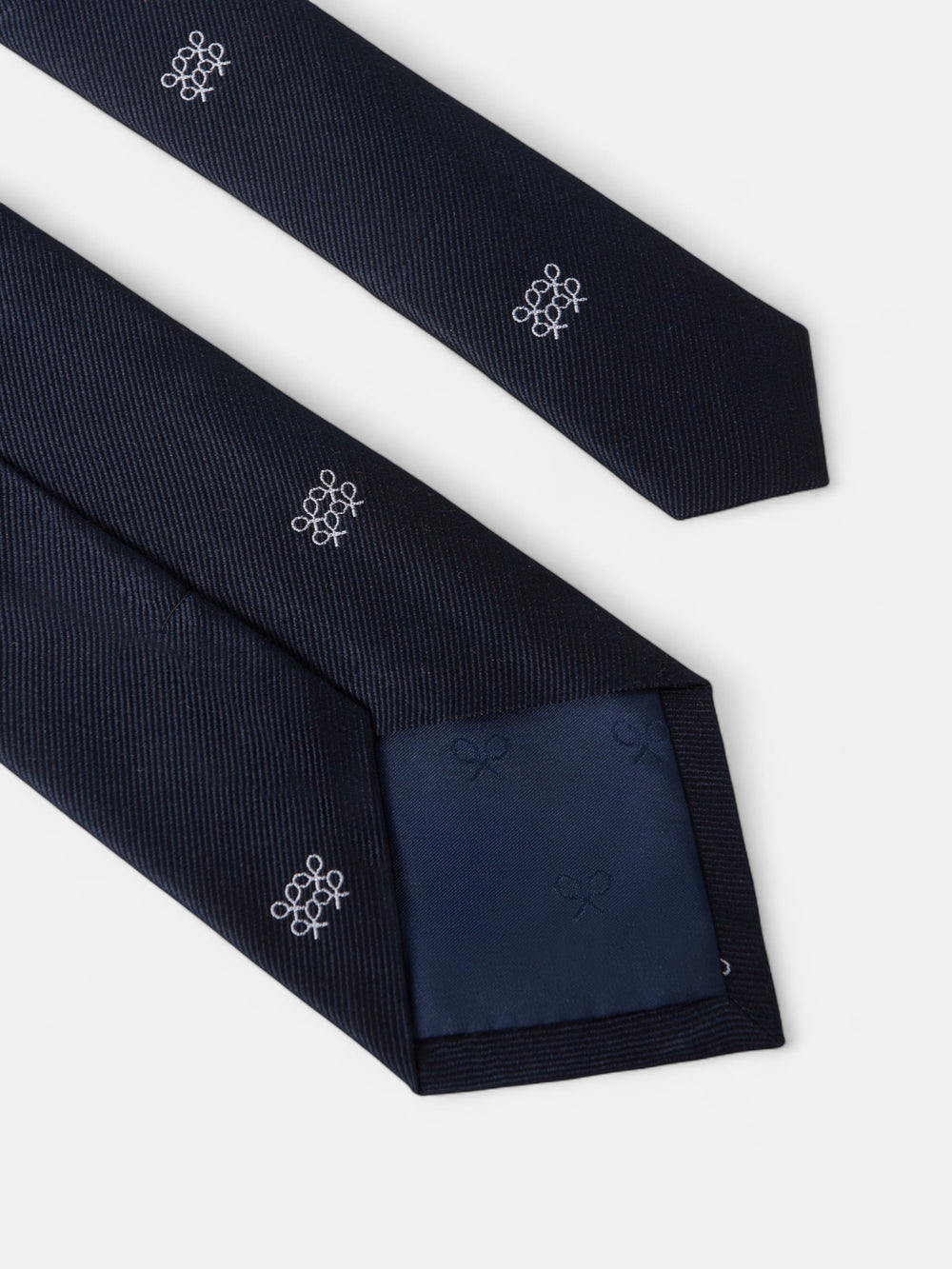 Gravata com padrão geométrico de raquetes azul-marinho