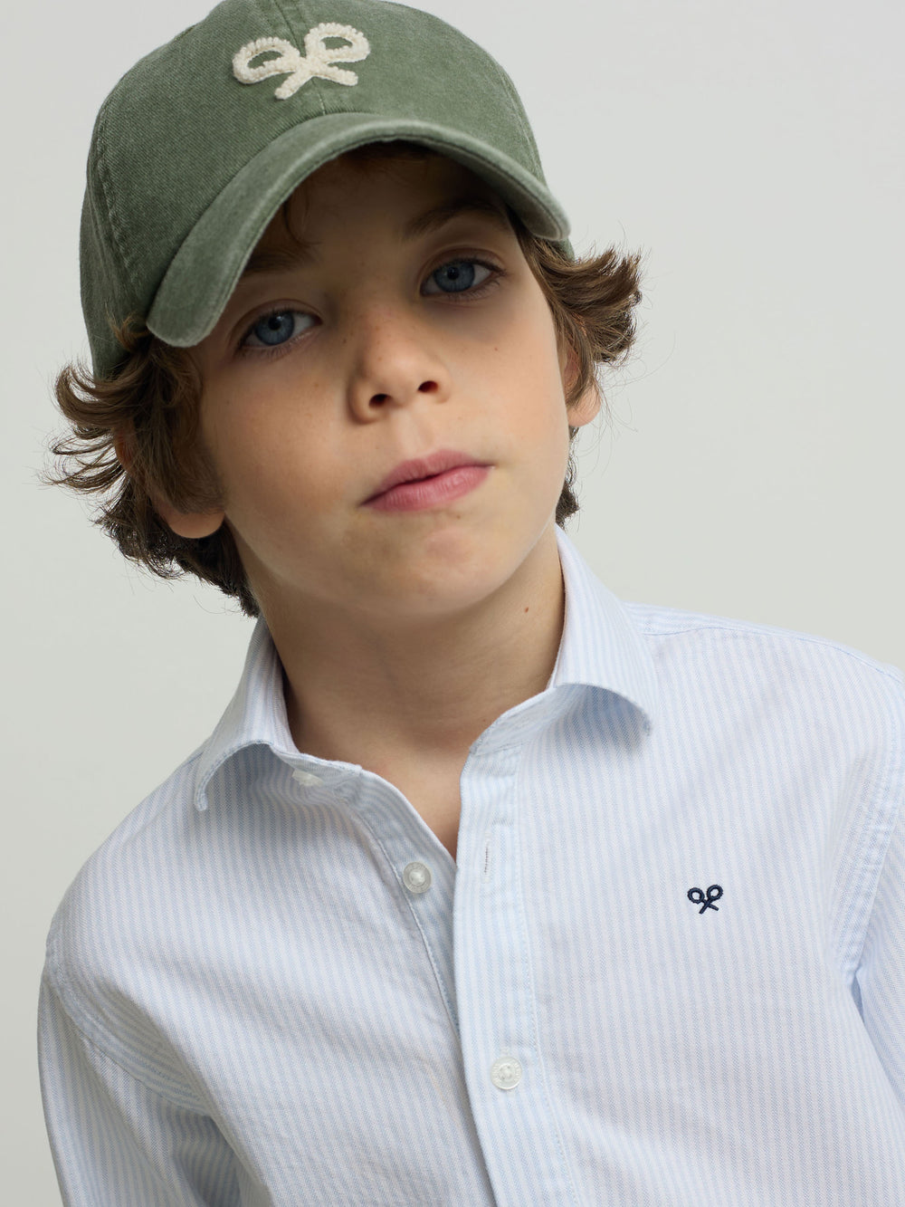 Polo de sport pour enfants à rayures bleues verticales