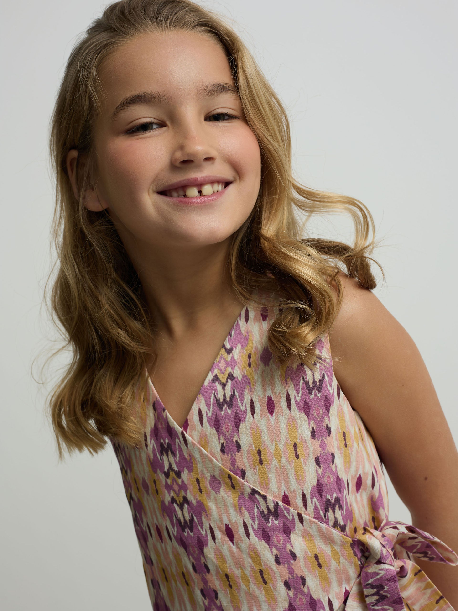 Girl's linen vest with pink ikat print